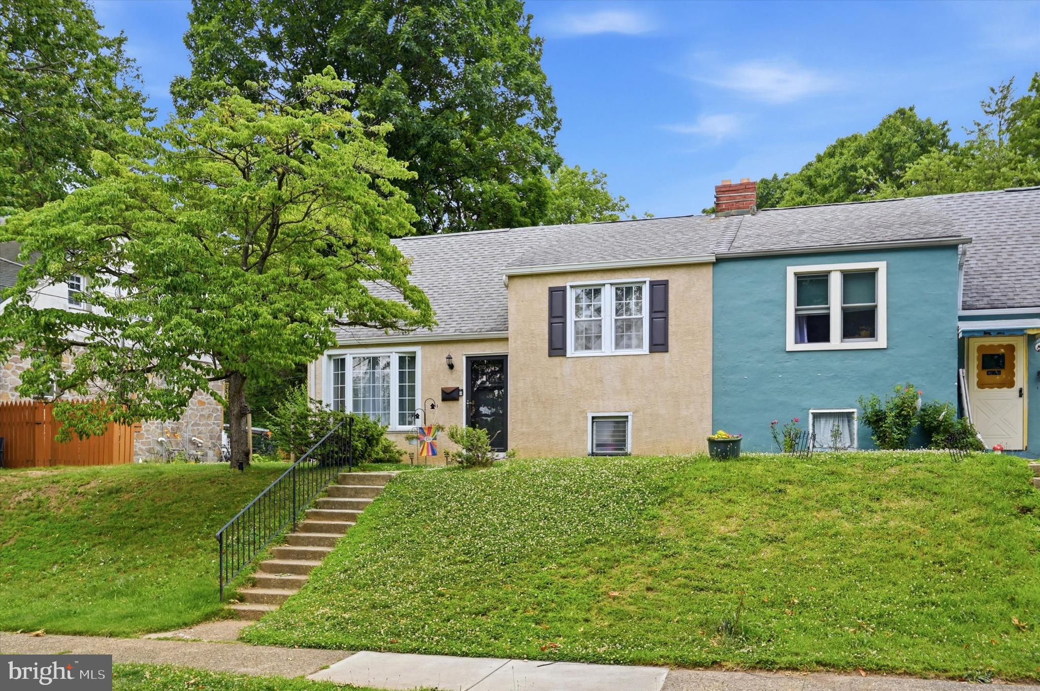 Welcome to this charming twin home in the highly desirable Andorra neighborhood. Step inside to a bright, sun-filled living room that creates a warm and inviting first impression. The recently renovated eat-in kitchen features classic white cabinetry, granite countertops, stainless steel appliances, and a stylish tile backsplash. Just off the kitchen, step outside to a patio overlooking the expansive backyard.  Upstairs, you'll find three spacious bedrooms and a beautifully renovated ceramic tile hall bathroom. The partially finished basement provides valuable additional living space and offers endless possibilities as a home office, gym, playroom, or hobby area. A separate laundry and storage area adds to the home's functionality.  Ideally located within walking distance of the Andorra Shopping Center, Andorra Stables, Fairmount Park, and public transportation, this home combines modern updates, outdoor space, and a convenient location in one of Northwest Philadelphia's most sought-after neighborhoods. Don't miss this wonderful opportunity to call this your new home.