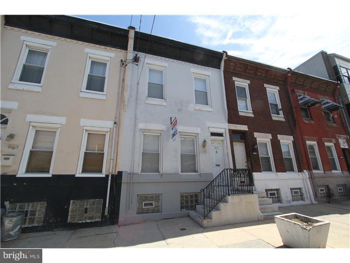 Welcome to this charming 2 story 3 bedroom 1.5 bath home in Point Breeze only a few blocks S of Federal St, American Sardine, and Breezy Cafe. This home is move in ready with features such as hard wood throughout, recessed lighting in the living and dining room, a beautiful side staircase with wooden banister, freshly painted throughout and bright white trim throughout. There is plenty of space for a formal living and dining room. The first floor has a convenient powder room with pedestal sink neatly tucked away and access to a small rear yard and basement access with Washer and Dryer. There is a brand new kitchen with granite counters and stainless appliance including a dishwasher, microwave, gas range and refrigerator. The 2nd floor has 3 bedrooms and a hall bath. The bath has cool retro tile work and a storage vanity. Central air. East to view. Visit today!
