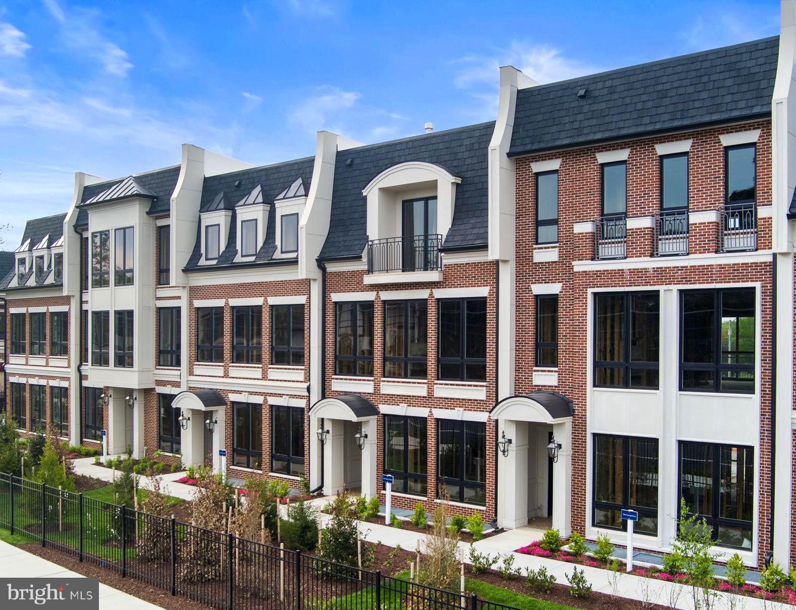 Open this Sunday from 1-4PM. Introducing Chain Bridge Estates — an exclusive new luxury home community in the heart of downtown McLean, Virginia, thoughtfully designed for discerning residents aged 60 and older. This elegant enclave offers the very best in independent living, where sophistication, comfort, and connection come together. This weekend we are announcing our Grand Opening Sales Event! Please visit our community sales center, Wednesday- Sunday, 1-4PM and plan your tour of our furnished model and clubhouse. Our quick delivery homes are almost complete!! This stunning Georgetown model features dramatic floor to ceiling windows and is filled with natural light. Each exquisitely appointed home features 3 to 4 bedrooms, private garages, optional in-home elevators (elevator ready), designer lighting and fixtures, chef-grade kitchens, home offices or sunrooms, guest suites, and spacious covered balconies. Refrigerated concierge closets allow for secure and seamless package and grocery deliveries. At Chain Bridge Estates, exceptional service is a standard. Our dedicated concierge team is professionally trained to provide personalized support hospitality, ensuring every resident feels pampered and cared for. The Clubhouse is nothing short of spectacular — furnished by Restoration Hardware and featuring a state-of-the-art fitness center, a spa with Hydroworx Therapy Pool, saunas, medical offices, and a serene private patio with teak furnishings, a wood-burning fireplace, and a fully equipped outdoor kitchen with gas grills perfect for entertaining. This gated and beautifully landscaped community offers walking trails, curated gardens, and open green spaces for both relaxation and activity. Wellness is central to the experience, with optional 24/7 in-home healthcare provided by Bayada, on-site concierge medical services, and a wellness suite that can accommodate your personal physician for in-person or virtual appointments. Visit our open houses or contact our dedicated team to plan your new amazing residence.
Photos are of a similar finished model and developer reserves the right to change pricing and features. Property taxes are estimated and set by the county upon completion. Floor plans vary per model and measurements are estimated.  Agents must accompany clients and register on their first visit. Thank you!