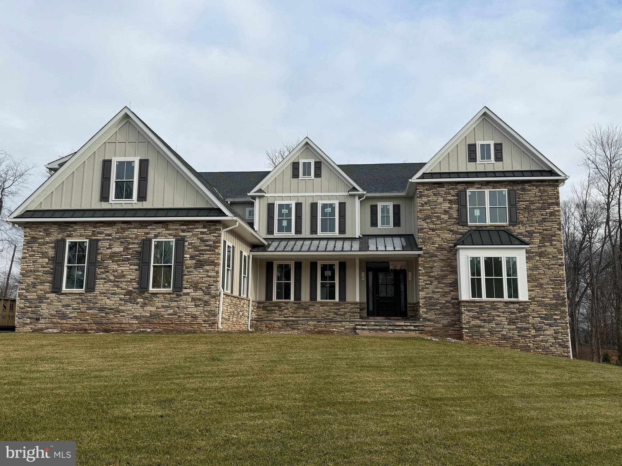 Unrivaled Luxury and Design: A Custom Estate Awaits in Doylestown Township. Discover the pinnacle of custom craftsmanship at Crimson Glen, Doylestown Township's exclusive new construction community by Mar Mar Builders. Poised on a beautiful 2.93-acre sanctuary, this magnificent estate spans over 7,285 square feet of meticulously curated living space. It is a masterpiece of design, defined by expansive scale and uncompromising luxury. The Details That Define Perfection: The primary level boasts dramatic 10’ ceilings on the first floor, 9’ on the second floor, 10’ in the basement, custom millwork including  baseboards, coffered ceilings, and solid-core doors. The true heart of the home is the Gourmet Chef's Kitchen, featuring a suite of professional-grade appliances from Wolf, Sub-Zero, and Bosch. A practical yet elegant three-stop elevator provides seamless access across all levels. The lower level offers an additional 2,903 square feet of finished space, ideal for a private theater, fitness studio, or executive offices. Unmatched Features & Craftsmanship: This 5-bedroom, 5.5-bathroom residence includes a 3-car garage, superior spray foam insulation, and endless possibilities for customization to ensure it is uniquely your own. Mar Mar Builders’ legacy of superior craftsmanship is evident throughout (photos showcase the builder's impeccable quality). Embrace privacy, elegance, and exclusivity in one of Bucks County's most coveted neighborhoods. Schedule your private viewing to experience this unparalleled Doylestown estate.