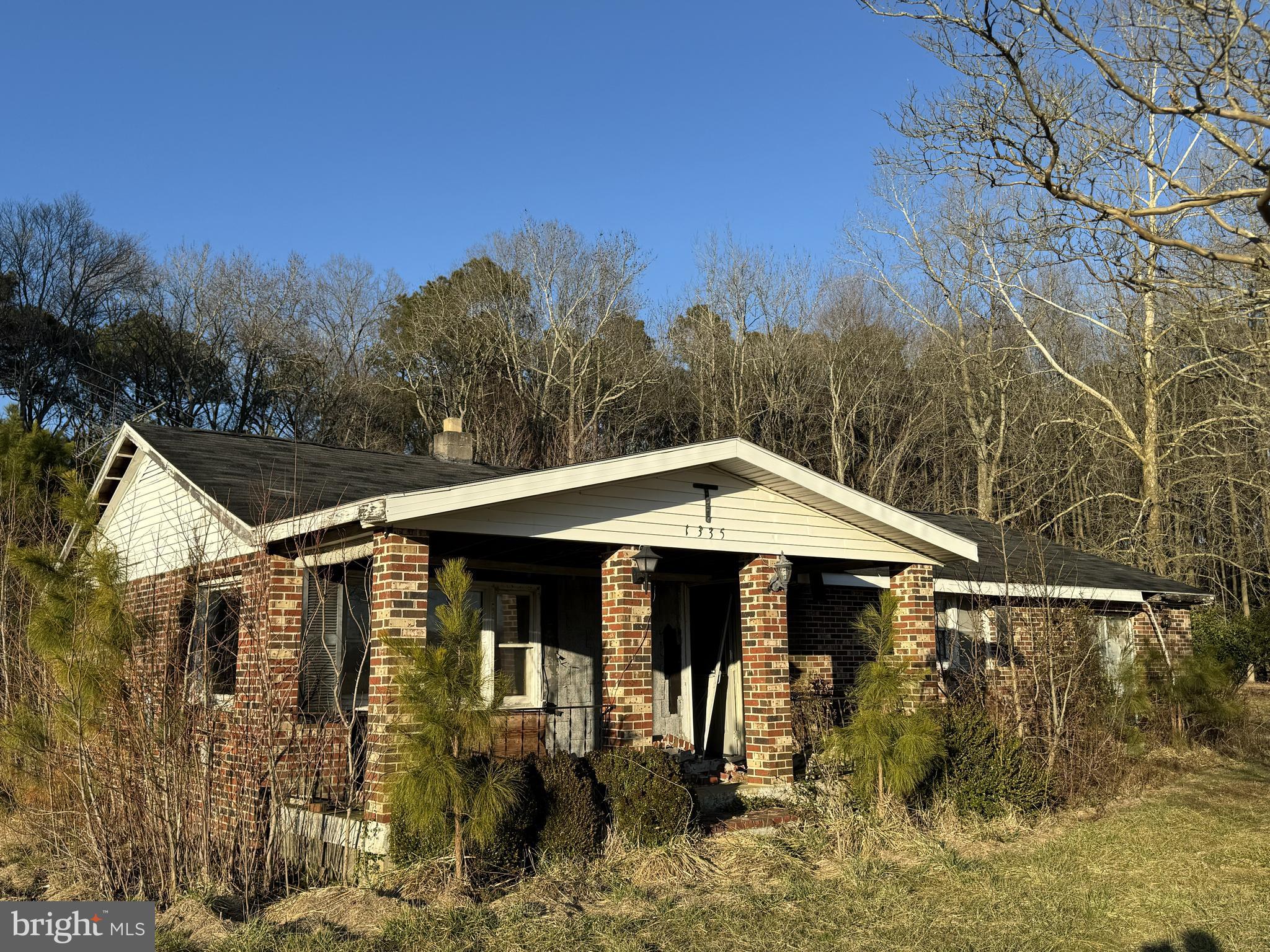 Home being sold as is where is.  Well and septic on site.  Septic install just before home was vacated.  Both were in good working order at time the home was vacated.  Fix the home up or rebuild.  Just a few minutes out of town.  Easy commute to NASA/Wallops Flight Facility.  Use caution when entering home.  House is sturdy and sound, but enter at your own risk.