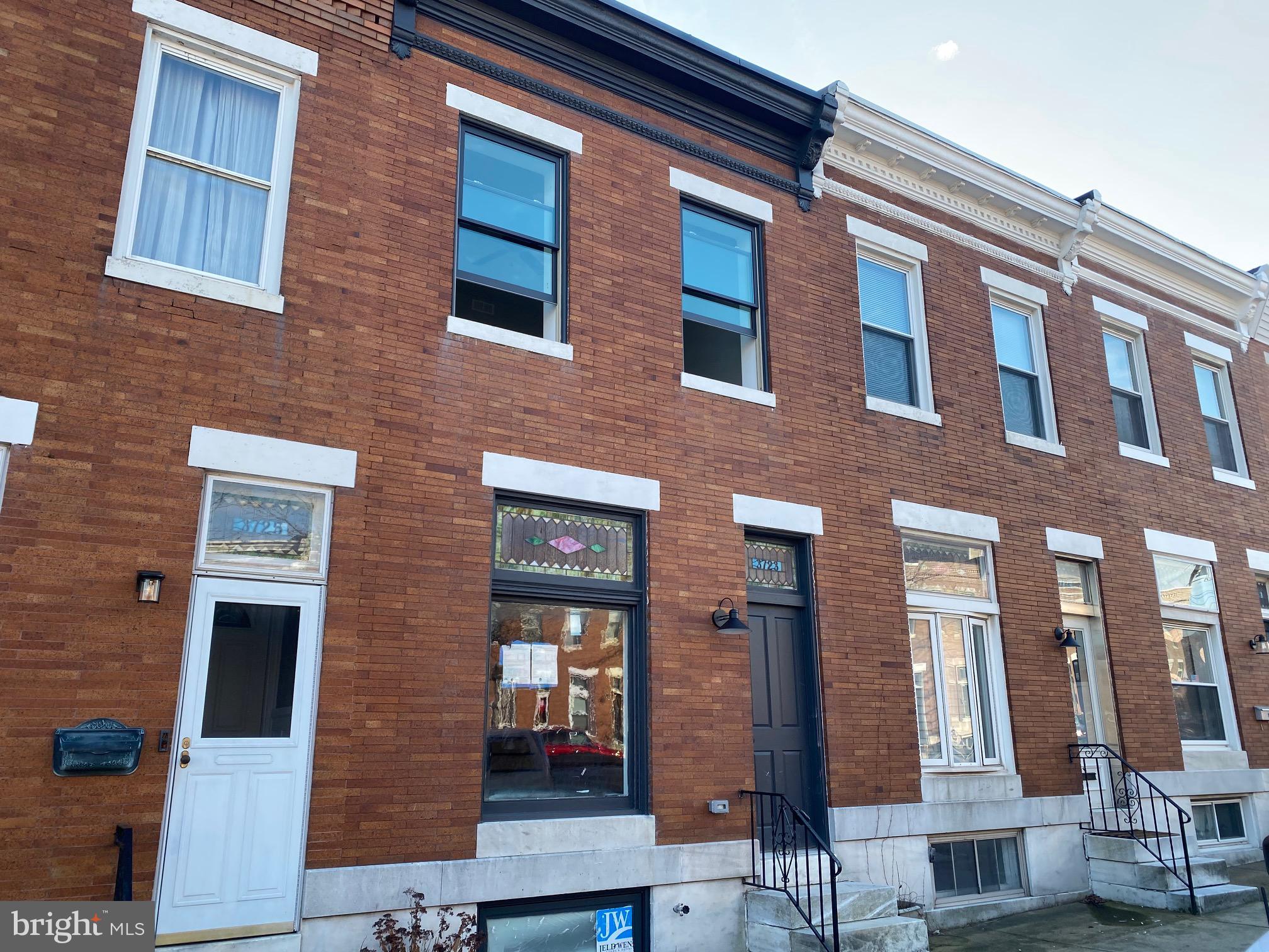 CHAP TAX CREDIT RENOVATION W/ LARGE REAR ADDITION & PARKING - 14' wide renovation w/ hardwood flrs, exposed brick, large island kitchen w/ ss appliances, quartz counters leading to large parking pad. Upper level offers 2 bedroom suites, dual vanity, luxurious shower, walk-in closet & hallway access to oversized roof deck. Finished 8' tall lower level w/ walk out - chap pending final approval.
