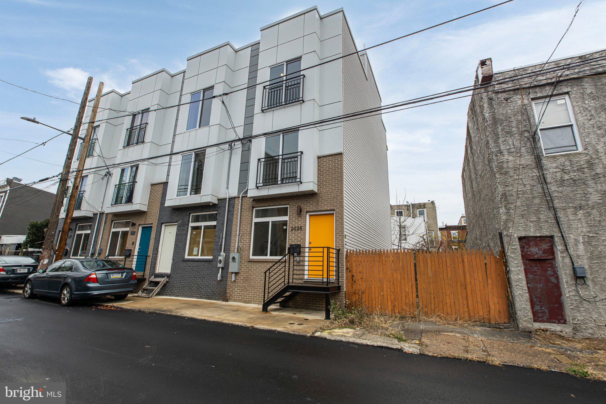 Welcome to 2035 N. Orianna Street — a stunning brand-new 3-bed, 3-bath home in the heart of Norris Square, offering luxury living, modern finishes, and a 10-year tax abatement!

This exceptional 3-story residence was thoughtfully designed for style and comfort. Step inside to an open, sun-filled living space with gleaming hardwood floors and a designer two-tone kitchen featuring crisp white and deep gray cabinetry, sleek corian countertops, a spacious island, and stainless steel appliances—perfect for everyday living and entertaining.

The second level offers two bright bedrooms with generous closet space and beautifully finished full bath.

On the top floor, your private oasis awaits: an entire level dedicated to the primary suite, complete with a private balcony, spa-inspired bathroom, and a custom bar area just steps away—ideal for morning coffee or evening cocktails.

A full finished basement with a third full bathroom provides even more flexibility—perfect for a guest suite, home office, gym, or media room.

Take entertaining to new heights on the expansive rooftop deck, showcasing panoramic views of the Philadelphia skyline that will take your breath away.

Nestled in the vibrant Norris Square neighborhood, you’re minutes from Fishtown, local parks, restaurants, cafés, and transit.

Brand-new construction, luxury finishes, rooftop views, finished basement, and a 10-year tax abatement—this is Philadelphia living at its finest. Don’t miss your chance to call this masterpiece home.