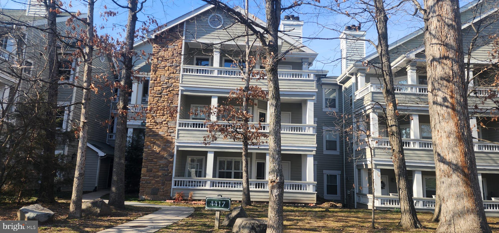 Located on the top floor in the highly desirable Stonecroft community, this beautifully maintained and freshly painted condo offers bright, airy living in the heart of Fairfax. Vaulted ceilings and expansive windows fill the home with natural light, highlighting the new flooring and open, flowing layout.

Step onto your private balcony—perfect for morning coffee or unwinding at sunset. Inside, a cozy fireplace adds warmth and charm, creating an inviting space year-round.

The kitchen is both stylish and functional, featuring brand-new granite countertops,  gas cooking, a pantry, and a breakfast bar. Recent updates include a new refrigerator, along with a brand-new microwave and brand-new oven/range. The HVAC system has also just been replaced, offering peace of mind for years to come.

This home includes two spacious bedrooms and two full bathrooms, with generous closet space throughout, including a walk-in closet in the primary suite. Enjoy the added convenience of in-unit laundry, plenty of parking spots, and abundant guest parking.  Water and sewer included in the condo fee.

Residents of Stonecroft enjoy a wide array of amenities, including a fitness center, outdoor pool, clubhouse, racquetball court, grilling and car wash stations, a dog park, plenty of parking for themselves and their visitors, scenic walking paths, and a bus stop to the Stringfellow commuter lot.

Ideally located just minutes from shopping, dining, and major commuter routes, this home offers exceptional accessibility. Nearby destinations include Fairfax Corner, Wegmans, Fair Oaks Mall, I-66, Route 50, and Fairfax County Parkway.