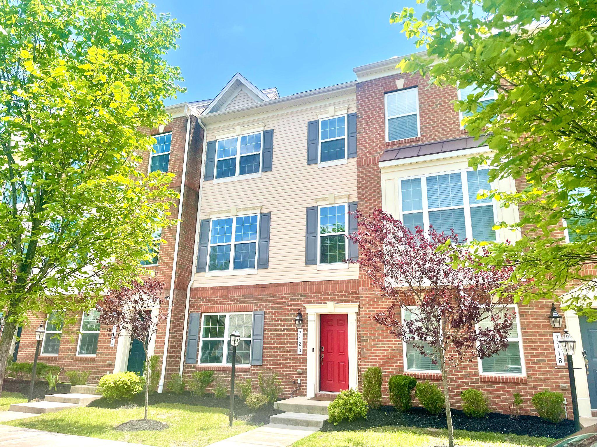 BEAUTIFULLY APPOINTED TOWNHOME!!! Spacious 4BDR, 3.5BA, 3-Level Townhome with a HUGE CHEF'S KITCHEN WITH ISLAND AND PENNISULA, A LARGE MAIN LEVEL DECK and 2 CAR-GARAGE! ALL FRESHLY PAINTED WITH WIDE PLANK HARDWOOD FLOORS THROUGHOUT THE ENTRY AND MAIN LEVEL!  Welcome to this beautifully maintained interior townhome offering comfort, style, and convenience across three fully finished levels. Step into the heart of the home—a chef’s kitchen complete with gleaming GRANITE COUNTERTOPS, STAINLESS STEEL APPLIANCES, ample cabinet and counter space, pantry and eat in kitchen —perfect for entertaining or everyday living. Enjoy the warmth of hardwood floors that flow throughout the main level, creating an inviting and elegant atmosphere.  The home also features a deck off the main level kitchen and a spacious 2-car garage, providing both storage and ease of access. Upstairs, the generous bedrooms include a luxurious primary suite with a private bath, while the lower level offers additional living space—ideal for a guest room, home office, or rec area. Nestled in a sought-after community with tree-lined streets, you’ll also have access to fantastic amenities including a community pool, fitness center, walking trails, and a shuttle to the Dorsey Marc Station for commuters . Just minutes to to all the shops and restaurants of Arundel Mills and BWI Airport. Centered between the action of the great cities of Washington DC and Baltimore, MD. This home truly has it all—space, style, and location. COME AND MAKE IT YOURS!!!