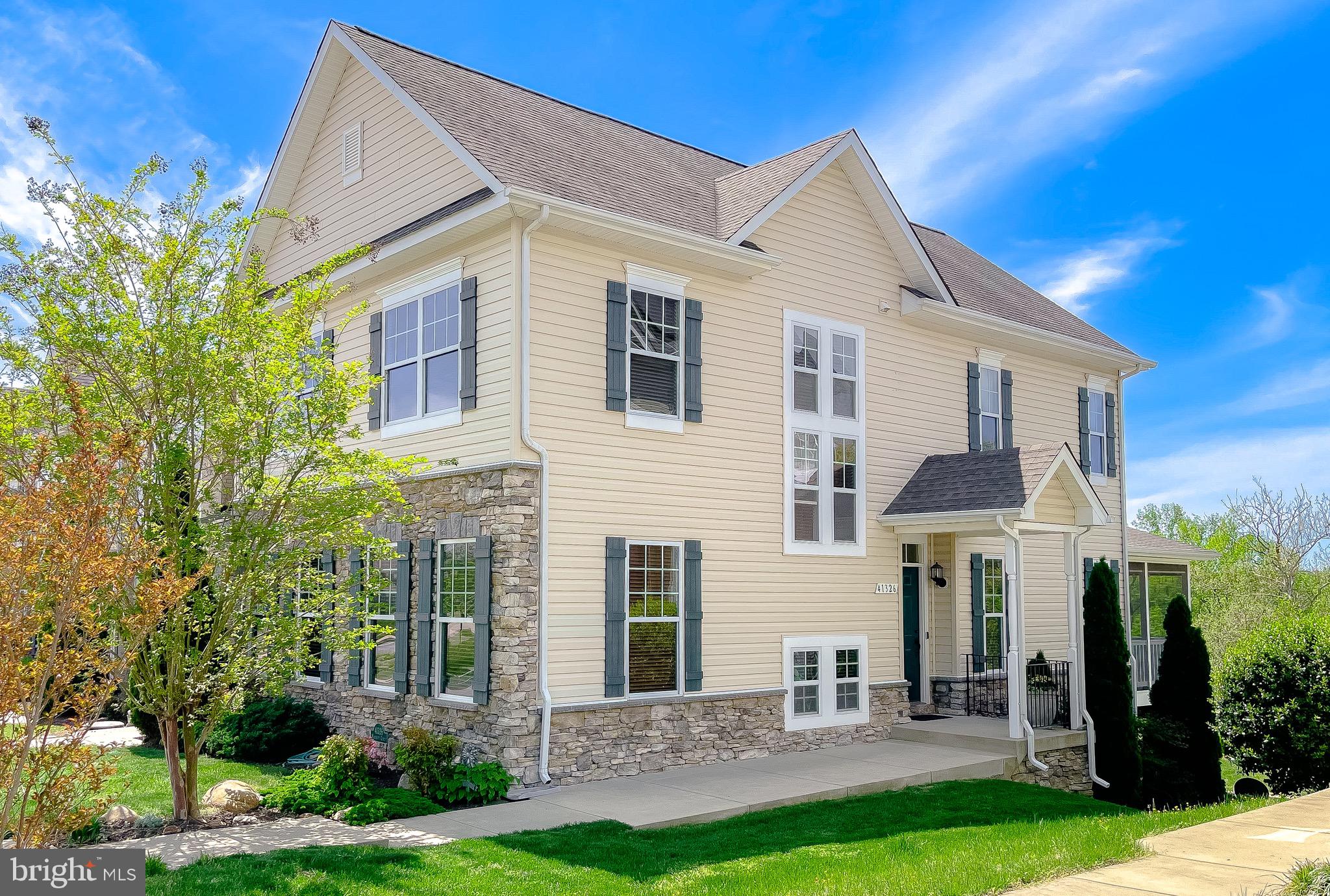 Stop the Car—This Is the One!

Welcome to this stunning and expansive 3,290 sq. ft. end-unit townhome that offers the perfect blend of elegance, comfort, and unbeatable location. From the moment you step inside, you’ll be captivated by the rich hardwood flooring on the main level and the abundance of natural light that pours in through the oversized end-unit windows.

The heart of the home is the thoughtfully designed kitchen, featuring granite countertops, ample cabinet space, and a generous  pantry.  Just off the kitchen, the spacious 16’ x 12’ great room offers flexibility for a grand dining area, a cozy lounge, or even your own lush indoor plant oasis.

Thanks to a 4-foot bump-out, the home feels even more open and airy—perfect for hosting gatherings or simply spreading out. The adjoining living room flows effortlessly into a charming screened-in porch with a  section unscreened for grilling —your own private retreat to enjoy serene pasture views with no other homes behind you. Watch the sunset and unwind in peace.

Upstairs, the luxurious primary suite features a massive walk-in closet that’s just waiting to be filled and an elegant ensuite bathroom with a soaking tub and separate shower. Two additional bedrooms, a full bath, and a convenient upper-level laundry  make this layout as practical as it is beautiful.

The fully finished lower level offers incredible versatility—currently set up as a fitness studio, this space could easily become a home theater, office, library, or guest suite. It also includes a full bathroom and direct access to the two-car attached garage.

Situated just steps from the trolley stop, this home offers effortless access to all the excitement of Leonardtown Square—perfect for evenings out, barhopping, or enjoying dinner without the drive. Live in the heart of one of Southern Maryland’s most vibrant communities and experience all it has to offer, right outside your door.

Don’t miss your chance to own this rare gem—schedule your showing today!