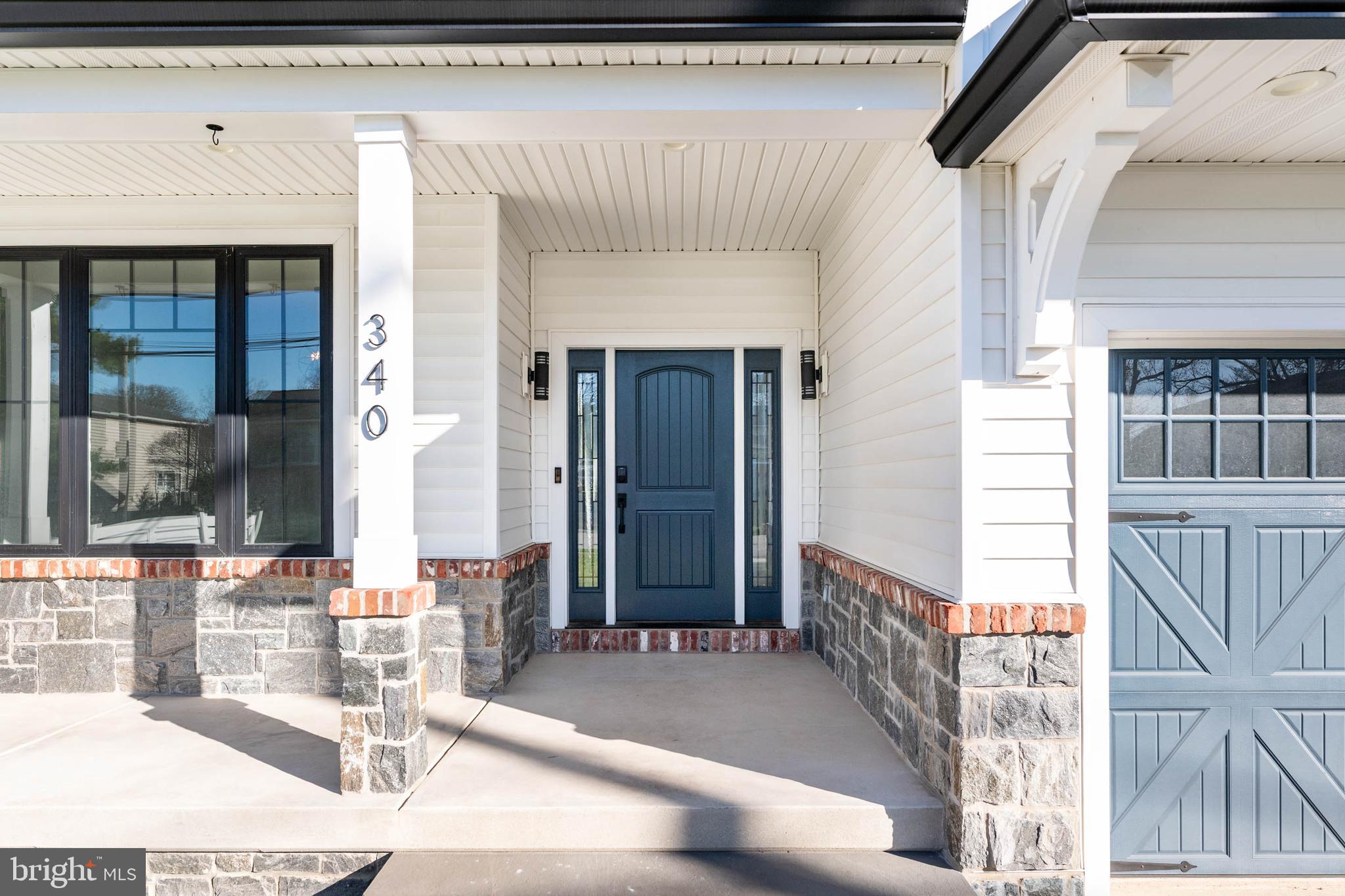 Step into this move-in ready residence offering the look and feel of new construction, all without the restrictions or fees of an HOA. This exceptional one-of-a-kind home showcases craftsmanship, thoughtful design, and uncompromising quality throughout. Personally designed and lightly lived in by an experienced designer-builder, every detail has been intentionally selected with finishes chosen for both beauty and performance. The exterior makes a lasting impression with timeless architecture, custom garage doors, stamped concrete, metal roofing accents, upgraded trim work, and a striking blend of reclaimed brick and stone. Expansive Andersen architectural windows with bold black framing create a dramatic yet welcoming presence while filling the interior with natural light. The fully enclosed backyard offers a private outdoor setting with a level, usable layout ideal for a future pool, outdoor kitchen, or custom hardscaping. White vinyl privacy and semi-privacy fencing create a secure environment, complemented by solar-powered accent lighting and custom aluminum gates. Inside, the light-filled layout features soaring ceilings, oversized windows, designer lighting, and a striking staircase with sleek metal cable railing. The chef-inspired kitchen offers custom cabinetry, premium granite waterfall countertops and backsplashes, designer lighting, custom hood, and top-of-the-line appliances. A butler’s area with a four-bottle wine pouring station adds convenience for entertaining. The open-concept design flows into the dining and living areas, highlighted by a dramatic 110-inch fireplace. The primary suite serves as a private retreat with tray ceilings, an expansive walk-in closet, and an all-season balcony overlooking the backyard, perfect for enjoying sunsets, winter snowfall, or fireworks. The spa-inspired bathroom features a double-seater Jacuzzi tub, dual vanities, dual showers, custom tilework, and a heated towel bar. The walk-in closet includes a premium Avera closet system.Additional highlights include oversized bedrooms, wide-plank hardwood flooring, upgraded millwork, and distinctive architectural details throughout. The powder room showcases a custom Philadelphia skyline penny tile mural. The second-floor laundry room features custom cabinetry, farmhouse sink, beverage cooler, and generous folding space. The partially finished basement provides approximately 1,800 square feet of additional space ready to be customized. Once completed, the home will offer approximately 5,200 square feet of refined living space. Built as a luxury model home with meticulous attention to detail, this property presents a rare opportunity to own a truly exceptional residence that must be experienced in person to be fully appreciated.