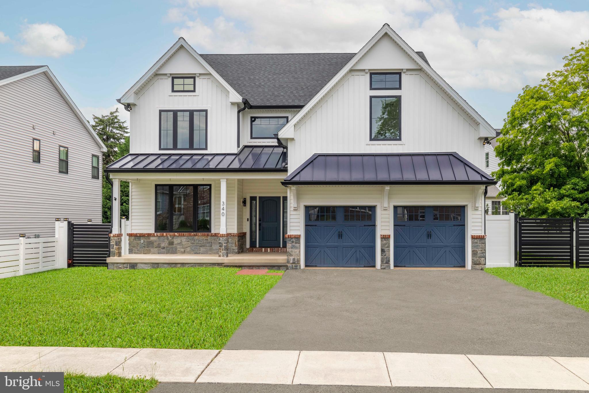 Step into this move-in ready residence offering the look and feel of new construction, all without the restrictions or fees of an HOA. This exceptional one-of-a-kind home showcases craftsmanship, thoughtful design, and uncompromising quality throughout. Personally designed and lightly lived in by an experienced designer-builder, every detail has been intentionally selected with finishes chosen for both beauty and performance. The exterior makes a lasting impression with timeless architecture, custom garage doors, stamped concrete, metal roofing accents, upgraded trim work, and a striking blend of reclaimed brick and stone. Expansive Andersen architectural windows with bold black framing create a dramatic yet welcoming presence while filling the interior with natural light. The fully enclosed backyard offers a private outdoor setting with a level, usable layout ideal for a future pool, outdoor kitchen, or custom hardscaping. White vinyl privacy and semi-privacy fencing create a secure environment, complemented by solar-powered accent lighting and custom aluminum gates. Inside, the light-filled layout features soaring ceilings, oversized windows, designer lighting, and a striking staircase with sleek metal cable railing. The chef-inspired kitchen offers custom cabinetry, premium granite waterfall countertops and backsplashes, designer lighting, custom hood, and top-of-the-line appliances. A butler’s area with a four-bottle wine pouring station adds convenience for entertaining. The open-concept design flows into the dining and living areas, highlighted by a dramatic 110-inch fireplace. The primary suite serves as a private retreat with tray ceilings, an expansive walk-in closet, and an all-season balcony overlooking the backyard, perfect for enjoying sunsets, winter snowfall, or fireworks. The spa-inspired bathroom features a double-seater Jacuzzi tub, dual vanities, dual showers, custom tilework, and a heated towel bar. The walk-in closet includes a premium Avera closet system.Additional highlights include oversized bedrooms, wide-plank hardwood flooring, upgraded millwork, and distinctive architectural details throughout. The powder room showcases a custom Philadelphia skyline penny tile mural. The second-floor laundry room features custom cabinetry, farmhouse sink, beverage cooler, and generous folding space. The partially finished basement provides approximately 1,800 square feet of additional space ready to be customized. Once completed, the home will offer approximately 5,200 square feet of refined living space. Built as a luxury model home with meticulous attention to detail, this property presents a rare opportunity to own a truly exceptional residence that must be experienced in person to be fully appreciated.