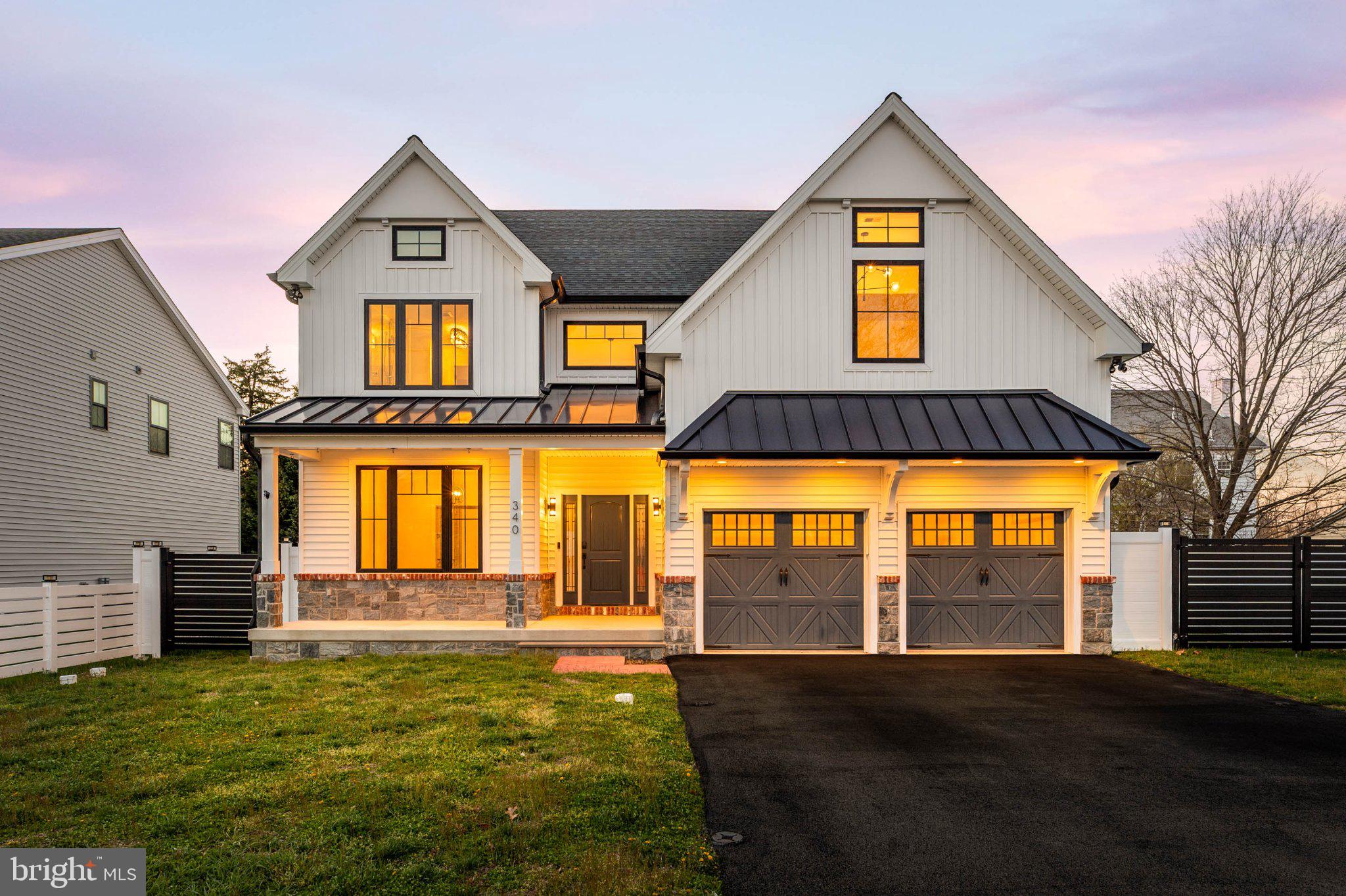Step into this move in ready residence offering the look and feel of new construction. This exceptional one-of-a-kind home showcases craftsmanship, thoughtful design, and uncompromising quality throughout. Personally designed and lightly lived in by an experienced designer builder, every detail has been intentionally selected with finishes chosen for both beauty and performance.
The exterior makes a lasting impression with timeless architecture, custom garage doors, stamped concrete, metal roofing accents, upgraded trim work, and a striking blend of reclaimed brick and stone. Expansive Andersen architectural windows with bold black framing create a dramatic yet welcoming presence while filling the interior with natural light. The fully enclosed backyard offers a private outdoor setting with a level, usable layout ideal for a future pool, outdoor kitchen, or custom hardscaping. White vinyl privacy and semi privacy fencing create a secure environment, complemented by solar powered accent lighting and custom aluminum gates. Inside, the light filled layout features soaring ceilings, oversized windows, designer lighting, and a striking staircase with sleek metal cable railing. The chef inspired kitchen offers custom cabinetry, premium granite waterfall countertops and backsplashes, designer lighting, custom hood, and top of the line appliances. A butler’s area with a four-bottle wine pouring station adds convenience for entertaining. The open concept design flows into the dining and living areas, highlighted by a dramatic 110-inch fireplace. The primary suite serves as a private retreat with tray ceilings, an expansive walk-in closet, and an all-season balcony overlooking the backyard, perfect for enjoying sunsets, winter snowfall, or fireworks. The spa inspired bathroom features a double seater Jacuzzi tub, dual vanities, dual showers, custom tilework, and a heated towel bar. The walk-in closet includes a premium Avera closet system. Additional highlights include oversized bedrooms, wide plank hardwood flooring, upgraded millwork, and distinctive architectural details throughout. The powder room showcases a custom Philadelphia skyline penny tile mural. The second-floor laundry room features custom cabinetry, farmhouse sink, beverage cooler, and generous folding space. The partially finished basement provides approximately 1,800 square feet of additional space ready to be customized. Once completed, the home will offer approximately 5,200 square feet of refined living space. Built as a luxury model home with meticulous attention to detail, this property presents a rare opportunity to own a truly exceptional residence that must be experienced in person to fully appreciate.