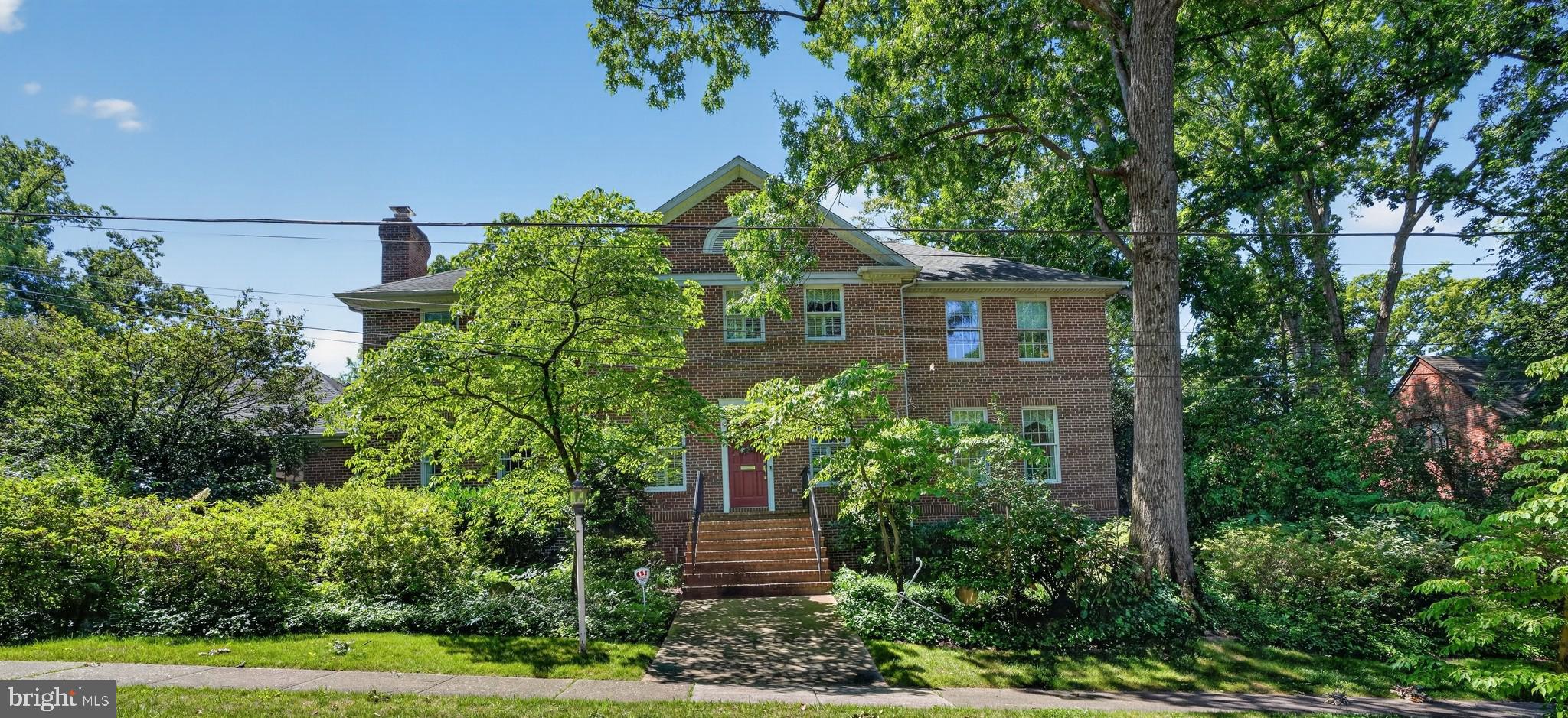 One of the finest homes in University Park!  Custom built in 1995 by Geaton DiZebba – builder of fine homes.  Solid all brick construction and high-end finishes throughout.  The home features an impressive 2 story entry foyer, 4 fireplaces and over 5,000 square feet of comfortable living space all situated on beautifully landscaped lot.   Beautiful hardwood floors on the main level.  Elegant living room features a gas fireplace and lots of natural sunlight.  Large formal dining room.  The beautifully designed kitchen has a cozy feel and features and abundance of cabinetry, subzero refrigerator, double oven, large island, pendant lighting and cozy breakfast nook.  Enjoy time in the library featuring a wood burning fireplace and the ultimate bookworm’s dream with built-in bookcases and the right mix of cozy seating, warm lighting, and clever design.  The luxurious super-sized primary bedroom boasts a sitting area with gas fireplace, ensuite bathroom with soaking tub that adds a touch of luxury to your daily routine, and large walk-in closet.  The finished lower level features a large rec room with gas fireplace, windows and recessed lighting for plenty of light; the remaining lower-level features voluminous storage solutions and a very spacious utility area.  Additional features include laundry on the second floor, chair lift, first floor full bathroom, 2 zone HVAC, 2 water meters; submeter for outside water, oversized 2 car garage which includes interior connecting steps to the basement, custom deck overlooking serene backyard and so much more!  All conveniently located to University of Maryland, Metro Stations, MARC train, Trader Joe's, Riverdale Park Station which includes Whole Foods, Burton's, Denizen's, and Gold's Gym, the upcoming Purple Line and major highways including I-495, I-95, I-295 and Route 50.