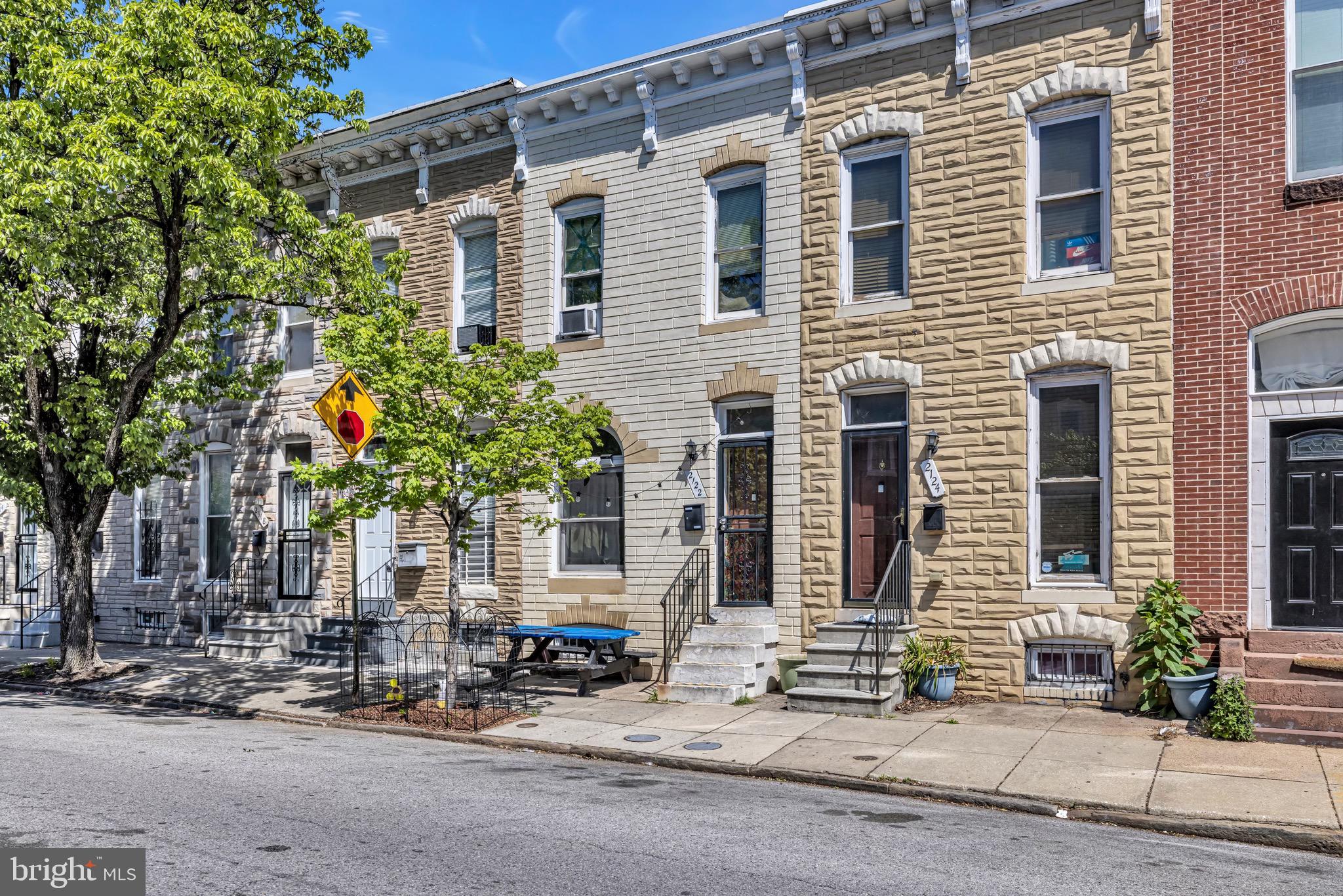 Perfectly positioned in the heart of the Johns Hopkins community, this charming home places you directly across from Johns Hopkins Hospital and just moments from the School of Nursing and Medical School. Whether you’re a medical professional, student, or investor, the location is hard to beat.
Inside, the home offers a functional and inviting layout with two upstairs bedrooms connected by a centrally located full bathroom. A convenient second-floor laundry closet with stacked washer and dryer adds everyday ease.
The main level features a bright living area with beautiful oak flooring, a separate dining space ideal for entertaining, and an eat-in kitchen equipped with oak cabinetry, gas cooking, built-in microwave, and stainless steel sink. Just beyond the kitchen, the rear yard offers both green space and rare private off-street parking access.
Enjoy outdoor relaxation under the electric retractable awning, creating a comfortable shaded patio area perfect for morning coffee or evening gatherings.
Additional improvements include a roof that is only 2 years old and efficient mini-split HVAC systems providing heating and air conditioning throughout both levels. The 6-foot basement offers generous storage space along with easy access to utilities and mechanical systems. Situated on a 13x80 lot, this property combines convenience, practicality, and an unbeatable location near Hopkins.