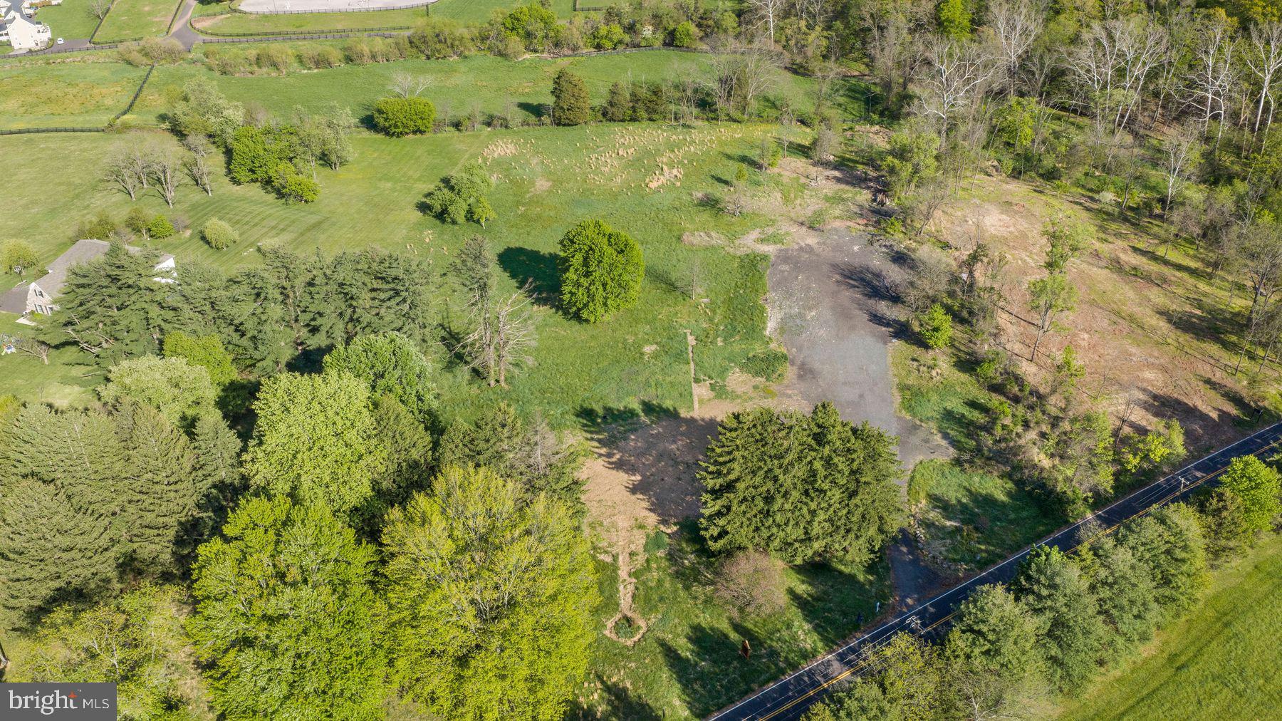 Quality land in Bucks County has become exceedingly rare, which makes this 5.46 acre lot on a lovely back country road that backs to a picturesque field of horses truly an exceptional opportunity.  Buffered for privacy with mature trees on 2 sides and rolling topography on the other, coupled with an opportunity for a center lot location of a custom designed Zaveta Custom Home and stately driveway approach, parcels like this just rarely become available.  Zaveta Custom Homes is the builder of record for this property, and their price to build starts at $700 per square foot (required minimum square footage to purchase this property is 4500).  Some enhancements are currently being made to the property, and photos will be forthcoming.