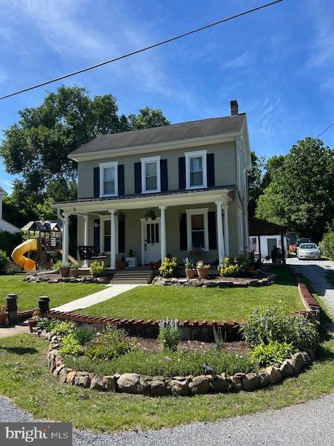 Rural charm. Nice landscaping. Raised garden beds in a fenced in area. Two storage buildings. Front porch with swing. 
Rear porch overhang for grilling and sitting. Older home but well maintained. New furnace, hot water heater and water pressure tank.
Enjoy the country setting. Creek nearby.