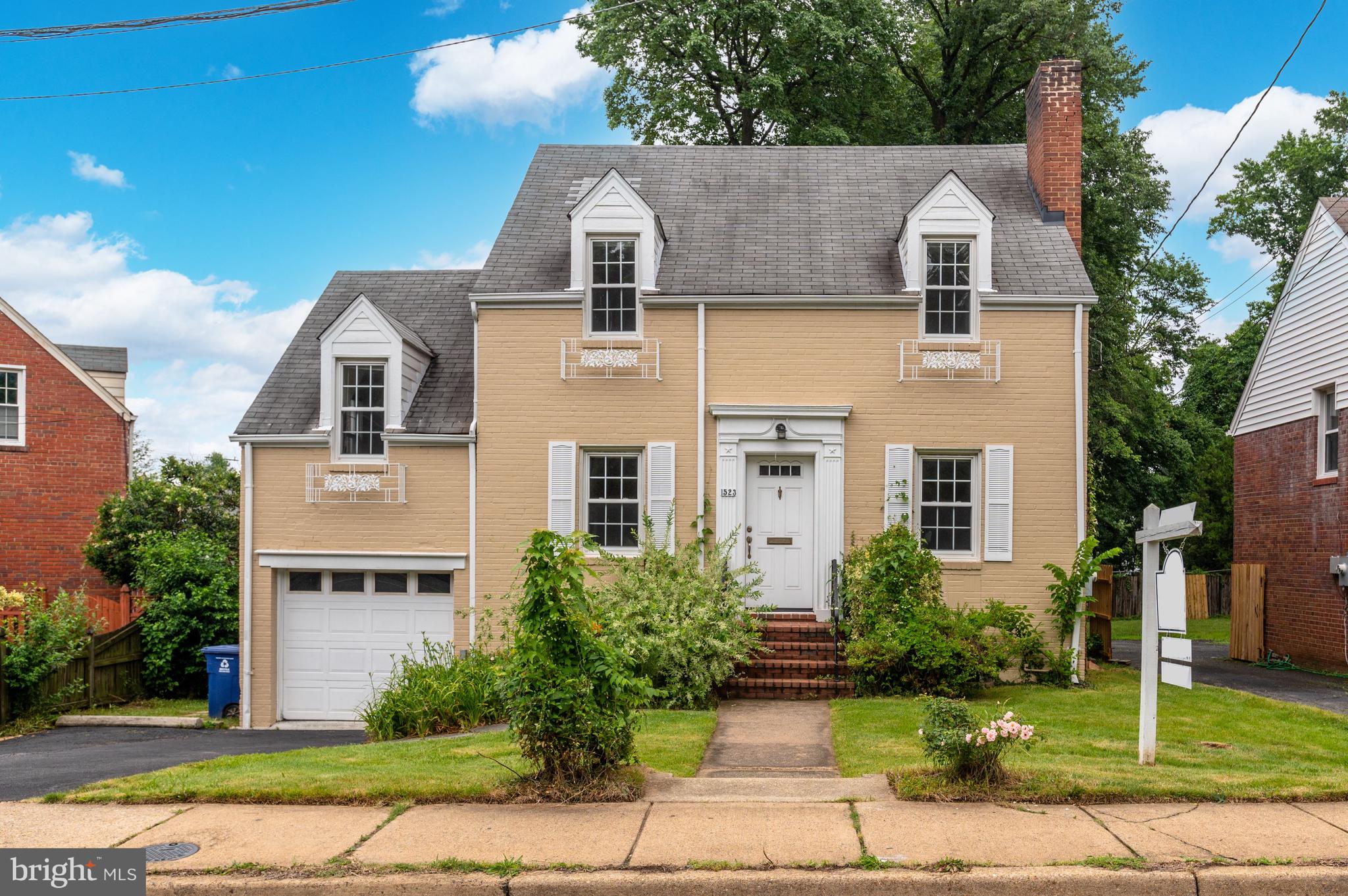Wonderful opportunity in the Waycroft-Woodmont neighborhood of Arlington!  This charming brick colonial offers hardwood floors throughout the main and upper levels and includes a large living room with a fireplace, a formal dining room with original plate railing and an eat-in kitchen with table space.  There is also a sunroom that overlooks the backyard and a powder room on this level. Upstairs, there are three spacious bedrooms with generous closet space and a full bath. The lower level features a recreation room with built-ins and a large utility/storage room with laundry. The backyard is fully-fenced and provides a patio and good-sized lawn. Close to Ballston with easy access to both I-66 and Route 50. Sold in 'As-Is' condition.