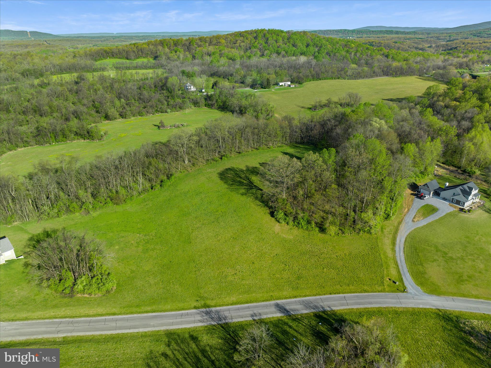 Your dream home starts here in the stunning, gated community of Crossings on the Potomac! This exceptional 3.26-acre lot offers the perfect canvas to bring your vision to life. Bring your plans, and build the custom home you have always dreamed of surrounded by the natural beauty and  this gorgeous setting.
As a property owner, you will enjoy full access to the community marina, boat ramp, and dock slips providing direct entry to the deep, navigable waters of the Potomac River. Whether you enjoy boating, fishing, or tubing, this property offers a truly exceptional outdoor lifestyle.

Just minutes from I-81, Maryland, and Virginia, Crossings on the Potomac delivers the best of Berkeley County living with convenient access to shopping, dining, and everyday amenities.

With very few lots remaining in this sought-after community, now is the time to act. Schedule your showing today and take the first step toward making your dream home a reality! 🏡