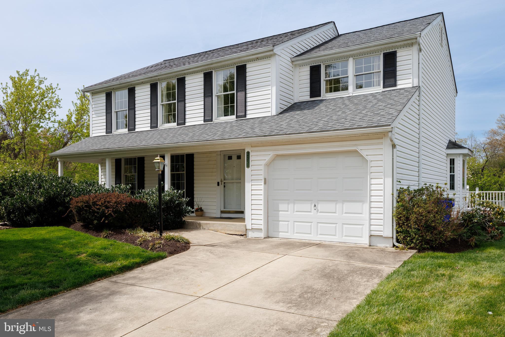 Impeccably maintained and thoughtfully updated, this stunning home in the desirable Sewell’s Orchard community offers 4 bedrooms and 2.5 baths across a spacious, light-filled layout. Enjoy a host of recent upgrades, including a remodeled family room (2024), luxurious primary bath and walk-in closet renovation (2023), new basement flooring (2023), new water heater (2019), and freshly painted shutters (2024). The kitchen is a chef’s dream with granite countertops, ceramic tile backsplash, gas cooktop with pot-filler, double wall ovens, a prep island, soft-close cabinetry, and updated refrigerator and dishwasher (2020). A sunroom just off the kitchen offers the perfect space to enjoy morning coffee with a view. Entertain effortlessly in the formal living and dining rooms featuring crown molding, chair railing, hardwood floors, and elegant lighting. Upstairs, the generously sized primary suite offers vaulted ceilings, a walk-in closet, dressing area, and a beautifully updated en suite bath. Three additional bedrooms and a full hall bath provide ample space for family or guests. The finished walkout basement includes a large recreation room—ideal for movie nights or a home gym—along with a dedicated workshop and laundry area. Outside, enjoy professionally landscaped grounds, a charming front porch, and an expansive deck overlooking tranquil pond views—perfect for relaxing or entertaining. Schedule your showing today!