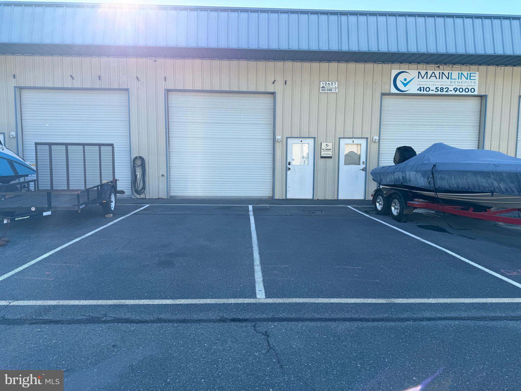 Fantastic warehouse space in desirable West Ocean City location!  Bayside Professional Center  12627 Unit #4.  Heated and Cooled! 2 parking spaces   Extra tall overhead garage door!  Full bathroom.  Unit is currently built out  with two separate office areas, that can be removed.   Endless opportunities.  Great location close to shopping, dining, golf courses, marinas and the beaches of Ocean City and Assateague Island!  Association fee $2,450 per year.  Very well maintained complex.