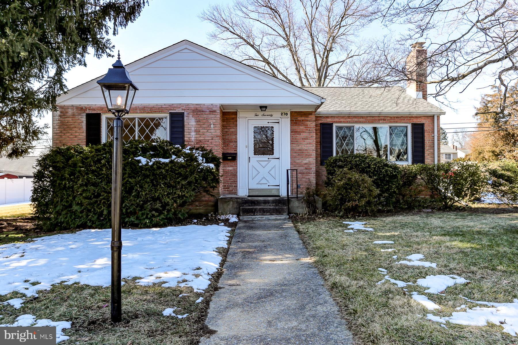 Looking for a convenient location and a nice neighborhood?  Then look no further!  This all-brick rancher on a large, level, corner lot, and located in popular Lenker Manor, is guaranteed to please!  Enter into a welcoming, nice sized living room with a wood burning fireplace and beautiful, just refinished hardwood floors.  Adjacent to the living room is a formal dining room, also with gleaming wood floors that leads into a fully equipped kitchen with plenty of cupboards and lots of counterspace.  There are three bedrooms, all with refinished wood floors and good closet space.  There is a full bath with a tub that has a shower, plus a separate shower stall for easier access.  The basement, though unfinished, has a half bath and a laundry area, and is great for storage or as a play area. A new roof was just installed in November of 2023 and the entire interior of the home was just painted in pleasing neutral tones!  At some point during ownership, the old windows were removed, and replacement windows were installed.  Enjoy central air and a lovely yard during the summer months,  Protect your cars from the elements of winter under the large two car carport that also has a shed to house the mower, yard tools and bikes!  The seller has generously included a one-year home warranty to give homebuyers peace of mind.  Come see for yourself, the value in this fine home but hurry... it won't last!