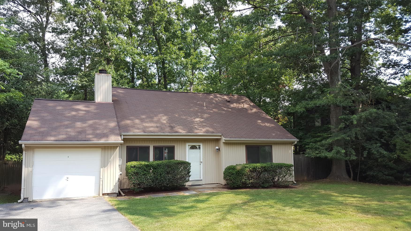 Wonderful wooded lot on quiet street walking distance to Dufief E.S.in Wooton HS cluster... Needs some work to make beautiful but priced to move* Contemporary floor plan w/soaring ceilings, Lots of light.. Versatile floorplan has Upstairs w/Loft & bedroom/bath. Deck off Kitchen made to enjoy private yard w/stately trees. Bids are due and will be opened and reviewed on Monday, 7/24**Sold As-Is*