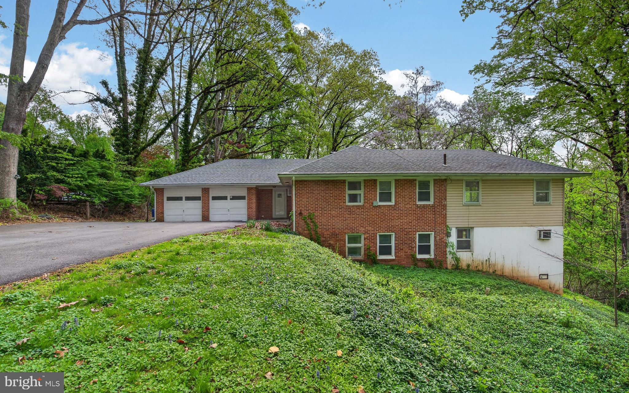 Rare opportunity to own a solid brick home on over two private acres in a prime Media-area location. Exceptional privacy, strong construction, and extensive system upgrades make this property an ideal long-term investment as well as a comfortable, high-quality place to live.

This is a truly rare opportunity to own a private, resort-like retreat in the heart of Media. Tucked away on a 2+ acre lot in prestigious Upper Providence Township - one of Pennsylvania’s most desirable suburbs - and just minutes from vibrant downtown Media, this home offers the perfect balance of privacy, nature, and everyday convenience. Set within the highly regarded Rose Tree Media School District, it also supports strong long-term value retention through one of the area’s most respected public school systems.

Surrounded by natural beauty, the property borders the renowned Broomall Lake Country Club and is within walking distance of the 32-acre Glen Providence County Park, a protected bird sanctuary featuring peaceful trails and mature woodlands. Every season offers something special, from lush spring greenery to vibrant fall foliage, and even the rare enjoyment of winter sledding right in your own backyard. Imagine enjoying your morning coffee with serene wooded views, spending afternoons exploring nearby trails, and unwinding in the evenings with complete privacy in your own natural sanctuary - all while being just minutes from dining and shopping in downtown Media, community events at Rose Tree Park, and convenient access to the Blue Route.

Inside, the home offers a bright, open, and flexible layout designed for modern living. With four well-proportioned bedrooms, including two potential primary suites (one on each level), the home is perfectly suited for multi-generational living, guests, or flexible work-from-home arrangements.

Thoughtful upgrades on the main level enhance both comfort and style, including a fully remodeled modern bathroom featuring a walk-in shower with marble flooring and porcelain wall tile. The remaining bathroom areas are finished with durable 2.5mm anti-slip, anti-scratch, water-resistant luxury vinyl flooring, while the rest of the upper-level living areas feature 3mm anti-slip, anti-scratch, water-resistant luxury vinyl flooring. Additional improvements include fresh designer paint, modern lighting, and a newly built open closet system. The updated gourmet kitchen features high-end appliances and a built-in wine cooler, making it ideal for both everyday living and entertaining. An oversized two-car garage provides added convenience and ample storage.

The finished lower level adds valuable, flexible living space, featuring a custom built-in closet and a classic brick fireplace that enhances warmth and character. The attached greenhouse provides a peaceful year-round retreat, perfect for relaxing or enjoying indoor-outdoor living.

Behind the aesthetics, the home delivers outstanding peace of mind with significant system investments already completed, including upgraded 200-amp electrical service with modern safety protections and whole-house surge protection (2025), a new water softener and drinking water system (2025), recent appliance upgrades including a washer tower and refrigerator (2025), a newer high-efficiency 5-zone boiler (2023), a newer water heater (2023), updated insulation (2022), and roof drainage improvements (2019).

With only three owners in its history - each of whom maintained and improved the property over decades - this home reflects long-term pride of ownership. It is now ready for its next chapter and the next owner to continue its legacy.

More than a home, this is a rare lifestyle and investment opportunity - offering privacy, nature, strong construction, and lasting value in one of the most desirable locations in the Media area.