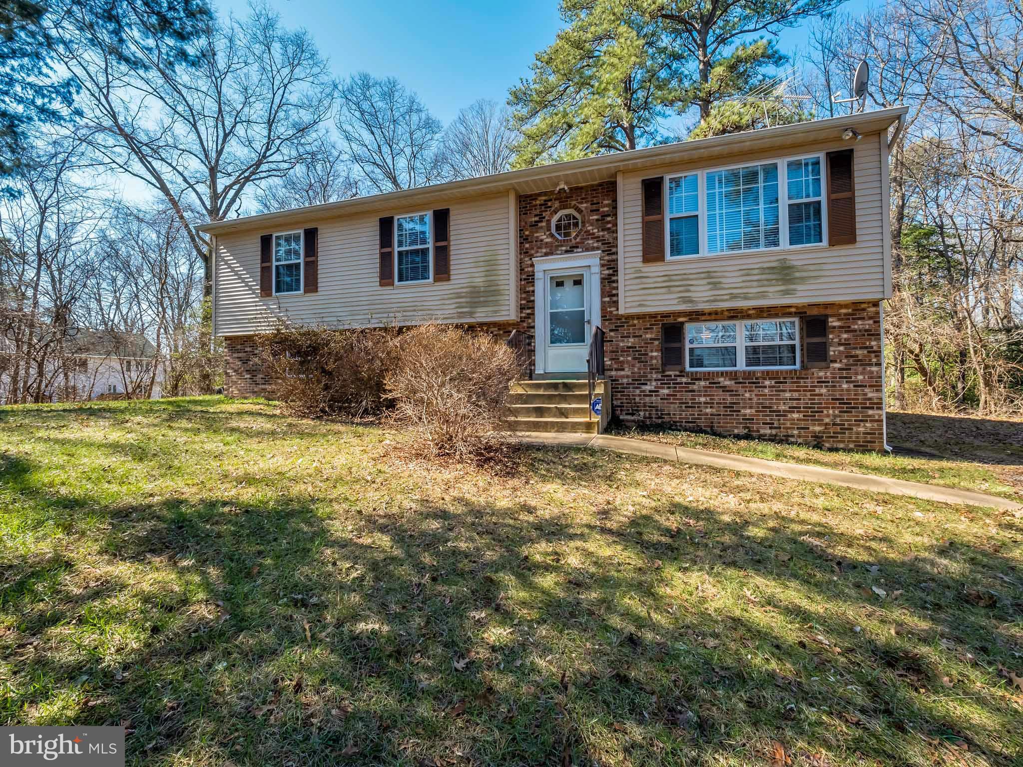 This house has great bones! With a little love this could be a great home! With almost 2 acres, you have a great front and back yard, privacy, and plenty of room for barbecues! 3 bedrooms and 2.5 baths and a large unfinished area where you could add more bedrooms. Don't miss out on this great deal! Priced to sell!