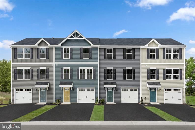 JUNIPER Townhome at Martinsburg Lakes by Ryan Homes. NO City Taxes!! Own a new Ryan home for less than rent! This Juniper offers the room you need with 1,535 square feet of living space, 3 bedrooms, 2 full baths, plus a finished basement area....and don't forget we include the washer/dryer   conveniently located on the bedroom level.  Martinsburg Lakes offers homes in the desirable Spring Mills School District. Enjoy a stroll on the sidewalk lined streets, a large park area with a covered picnic pavilion - perfect for family gatherings, a brand new playground, & massive dog park for Fido. Homeownership is within your reach! Photos are representative. Ryan Homes is taking precautionary measures to protect our valued customers & employees. Our models are open by appointment.  We make it easy for you!