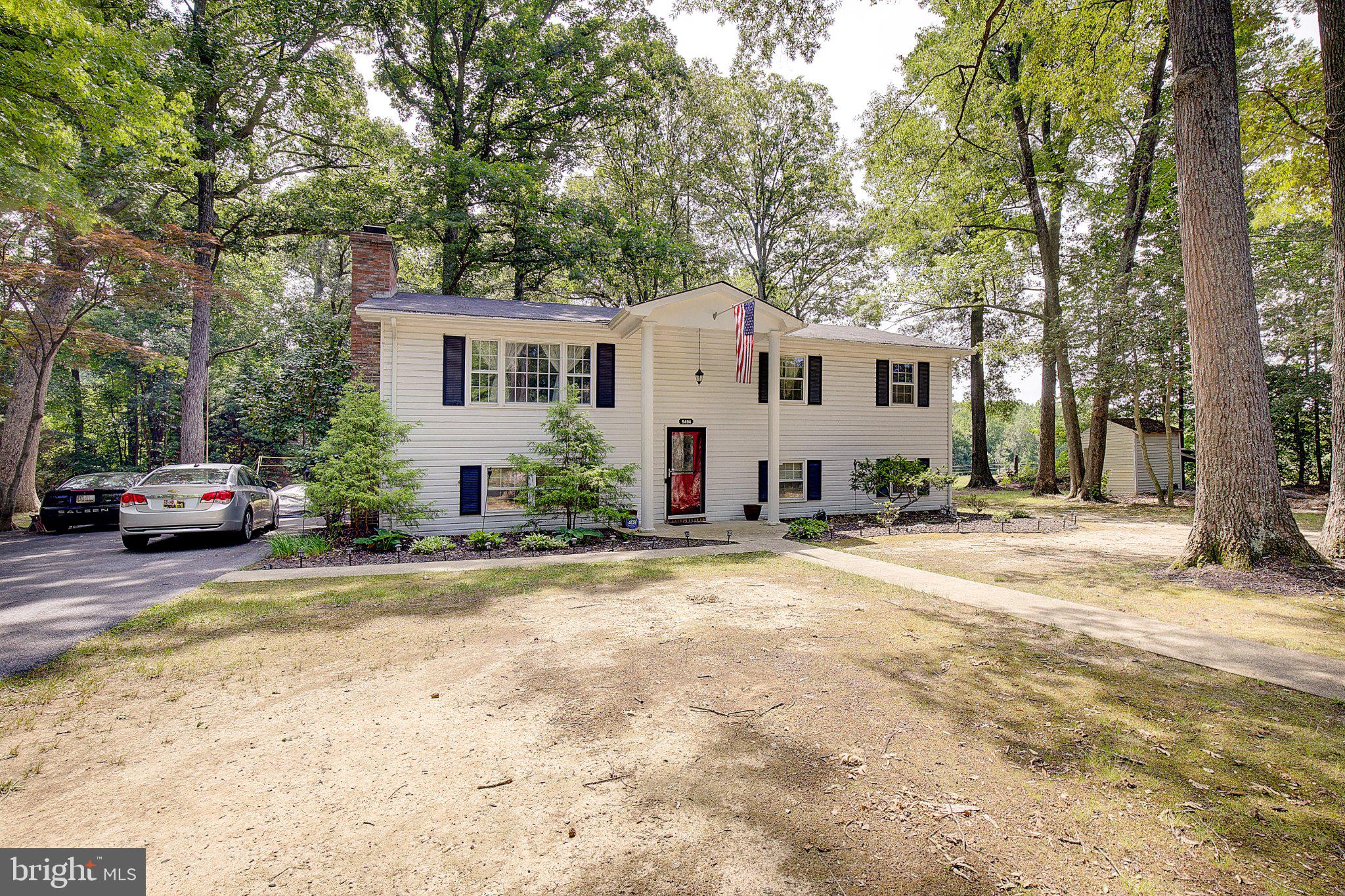 Peace, Privacy & Room to Grow in the Heart of Calvert County

Tucked away at the end of a long private driveway and surrounded by trees, this beautiful split-foyer home offers the perfect blend of privacy, space, and convenience. Situated on 1.21 acres backing to open farmland, you'll enjoy peaceful country living just minutes from shopping, dining, entertainment, and everyday amenities in Prince Frederick.  A private haven that offers the serenity of rural living without sacrificing convenience.

Inside, you'll find over 2,300 square feet of finished living space featuring 5 bedrooms, 2.5 baths, refinished hardwood floors, fresh paint, and thoughtful updates throughout. The main level offers a spacious family room, formal dining area, and an oversized kitchen that opens to a spectacular deck overlooking the private backyard—perfect for morning coffee, outdoor dining, or simply taking in the views.

The fully finished lower level expands your living and entertaining options with a cozy fireplace, recreation area, bar space, and flexible rooms ideal for a home office, guest suite, gym, or additional bedroom. With two fireplaces, updated finishes, and plenty of room for everyone, this home is designed for both everyday comfort and memorable gatherings.

 If you've been searching for a move-in ready home with acreage, privacy, and easy access to everything Calvert County has to offer, this is one you won't want to miss! 

Eligible for USDA financing!!