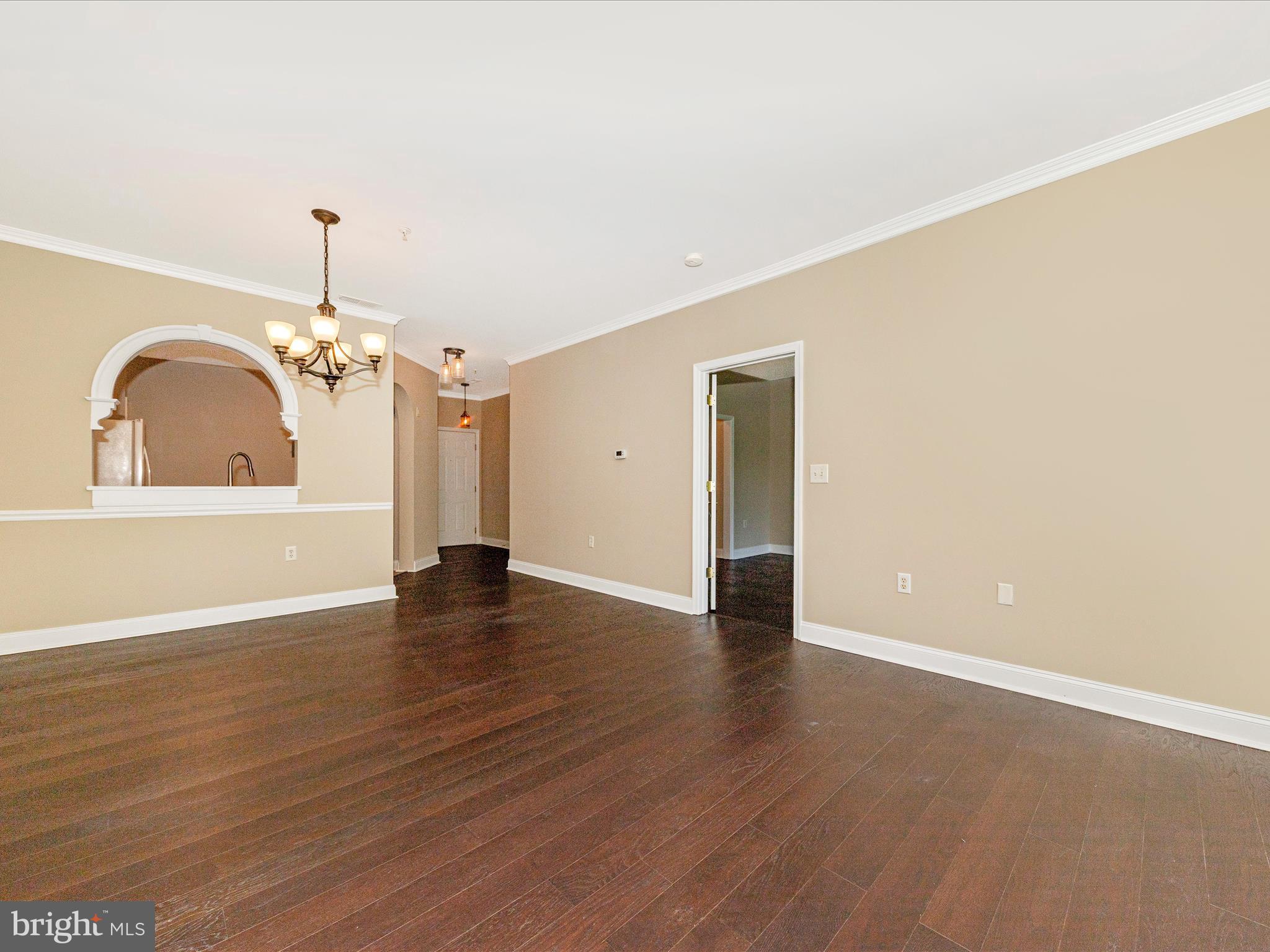 This Penthouse model condo features 2 large bedrooms and 2 full baths in a secure building with elevators! Fresh paint, LVP flooring, beautiful fireplace and a private balcony that overlooks a serene wooded area all await you.  Sit outside and watch the deer or relax by the cozy fireplace with your favorite hot beverage. Private garage parking space AND one in front of building.  You will get to enjoy all of  Wormans Mill community activities, like the pool, community building, basketball and tennis courts, playground and walking trails.  This condo is convenient to shopping, dining and all that Frederick has to offer.  Make your appointment to see it today!