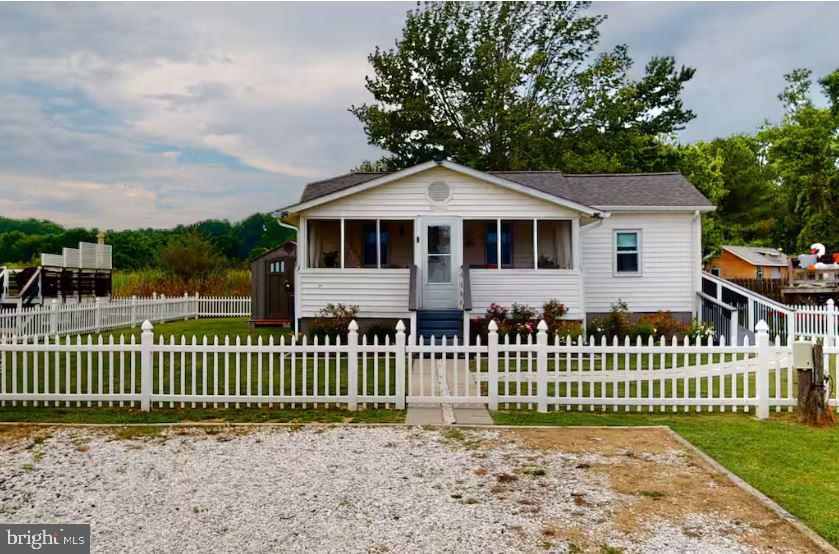 Chesapeake Beach Coastal Retreat 🌊 Welcome to 5237 Breezy Point Rd, Chesapeake Beach, MD — your perfect escape by the water! ✨ 2 Bedrooms, 1 Bath ✨ Sleeps 5–6 comfortably ✨ Steps from the beach ✨ Fully renovated & move-in ready ✨ Breathtaking sunrises and sunsets Imagine waking up to the sound of the waves, sipping coffee while watching the sunrise over the Chesapeake Bay, and ending your evenings with stunning sunset skies just steps from your door. This charming coastal retreat offers the perfect blend of relaxation and modern comfort, making it ideal as a primary residence, weekend getaway, vacation home, or investment property. Enjoy beach walks, salty breezes, peaceful mornings, and the laid-back Chesapeake Beach lifestyle — all at an incredible value. Whether you're entertaining guests, escaping city life, or searching for your own slice of waterfront paradise, this home delivers the lifestyle everyone dreams about. You've got to come to this “Affordable Coastal Living Home With Private Beach Access — Without the Million-Dollar Price Tag.” Still being within commuting distance to DC/MD/VA areas At $380K, this listing hits a sweet spot for: first-time buyers, downsizers, weekend/vacation-home buyers military buyers using VA buyers priced out of Annapolis waterfront living, remote workers wanting lifestyle over square footage Come take a look and Say Yes to this Address! (The furnishings are negotiable)