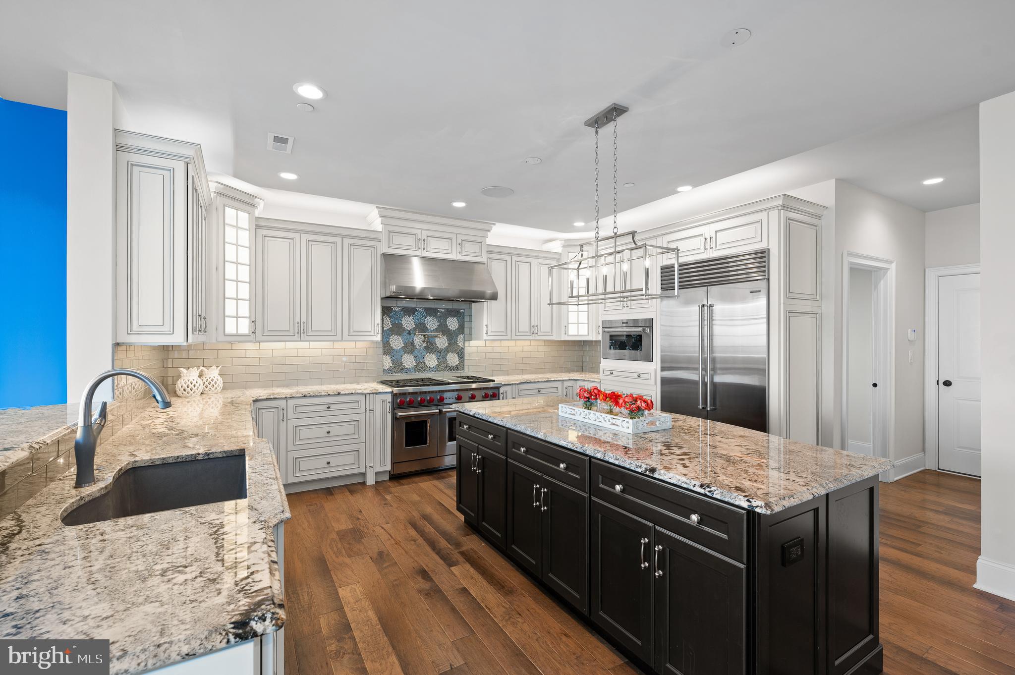 OPEN HOUSE CANCELLED. Don't miss this gorgeous home in the prestigious Liseter community in Newtown Square! This exquisite single expanded “Duke” model boasts 4 spacious bedrooms, 3.5 luxurious bathrooms, and over $360,000 in upgrades.  As you approach the house, you will notice a fully paved driveway and elegant curved walkway to the front door. You'll be greeted by an airy 2-story foyer and a sweeping curved staircase with upgraded wrought iron spindles. To the left is the grand living room featuring a stunning tray ceiling and a charming bay window that bathes the space in natural light. The adjacent dining room, also outfitted with a tray ceiling, is perfect for hosting intimate dinners or holiday celebrations. The open floor plan is accented by the 2-story, expanded family room with floor-to-ceiling stone gas fireplace, built-in custom wall unit and coffered ceiling with extra large ceiling fan. The built-in wet bar with mirrored backsplash is so convenient when entertaining! Open to the family room is the gourmet kitchen, equipped with top-of-the-line WOLF range with 2 ovens, six burners and a griddle, a custom tiled backsplash and a pot filler, WOLF microwave and a Subzero refrigerator, level 5 custom cabinetry, walk-in pantry, upgraded countertops and a large center island, making it a chef's delight.  One of the highlights of this home is the bonus “Naples Sunroom” off the kitchen. This light and bright room can be used as a breakfast room or a serene retreat where you can enjoy your morning coffee or unwind with a good book. Off this bonus room is a huge maintenance-free deck with built-in outdoor kitchen, complete with grill and stainless beverage cooler. The office is a perfect work from home option with additional phone/data Cat6 cable. The mudroom, half bath, and an expanded 2 car garage complete this floor. Upstairs, the expanded primary suite is a true sanctuary, featuring a spacious bedroom, sitting room, 2 walk-in closets with a closet system, and a spa-like en-suite bathroom with dual vanities, make-up vanity, a Whirlpool tub, and a separate shower. There is a princess suite with an attached bathroom with a tub/shower combo and 2 spacious bedrooms with upgraded carpeting that share a hall bathroom. You will enjoy the convenient second floor laundry. The lower level features a daylight walk up basement, 10’ ceilings, and a rough-in for a future bathroom. Some of the many special features include: built-in speakers in the ceiling, hardwood flooring throughout the first floor and second floor landing and primary suite, and the upgraded “Charleston” trim package. There is also a hook up outside for a generator.  The Liseter community offers a wealth of amenities, including walking trails, a clubhouse, gym, and a swimming pool, and community social events, ensuring a vibrant and active lifestyle. Conveniently located near shopping at Ellis Preserve with Whole Foods, dining, and next to top-rated Episcopal Academy and Marple Newtown Schools. Don’t miss the opportunity to make this stunning Duke model your forever home. The unparalleled Liseter lifestyle awaits you!