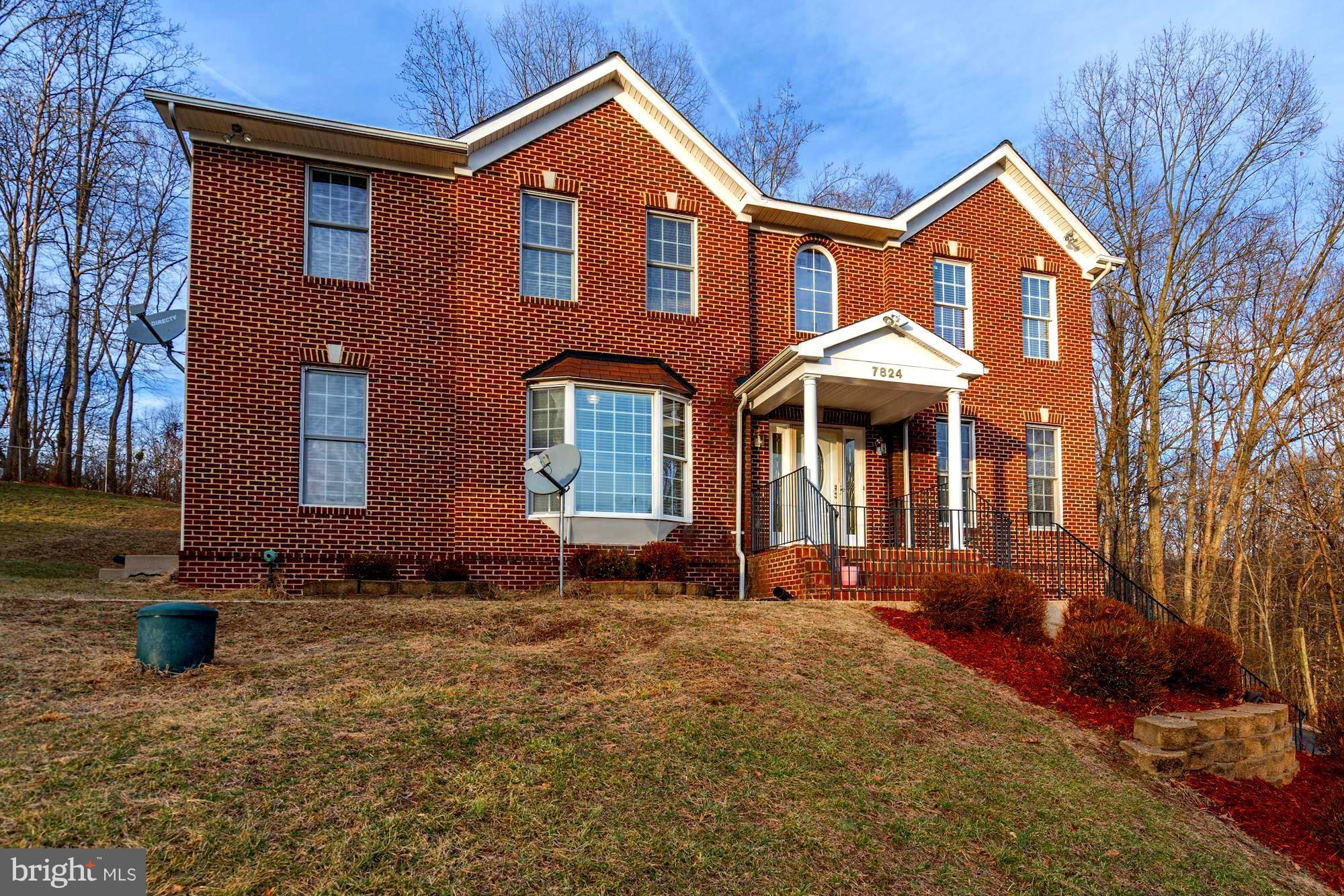 One of a kind!!! 5Bed 3.5 Bath w/private backyard & almost 3400 finished Square feet. Kitchen w/White Cabinets, Granite counter, and SS Appliances. Hardwood floors on the main level with walkout to Screened in porch & huge deck. Custom paint on all 3 levels w/Mother in law Suite in the basement w/Jacuzzi Jets & Sep Shower. Wood bar in the basement for entertainment. 45K below Zillow Est True Deal.