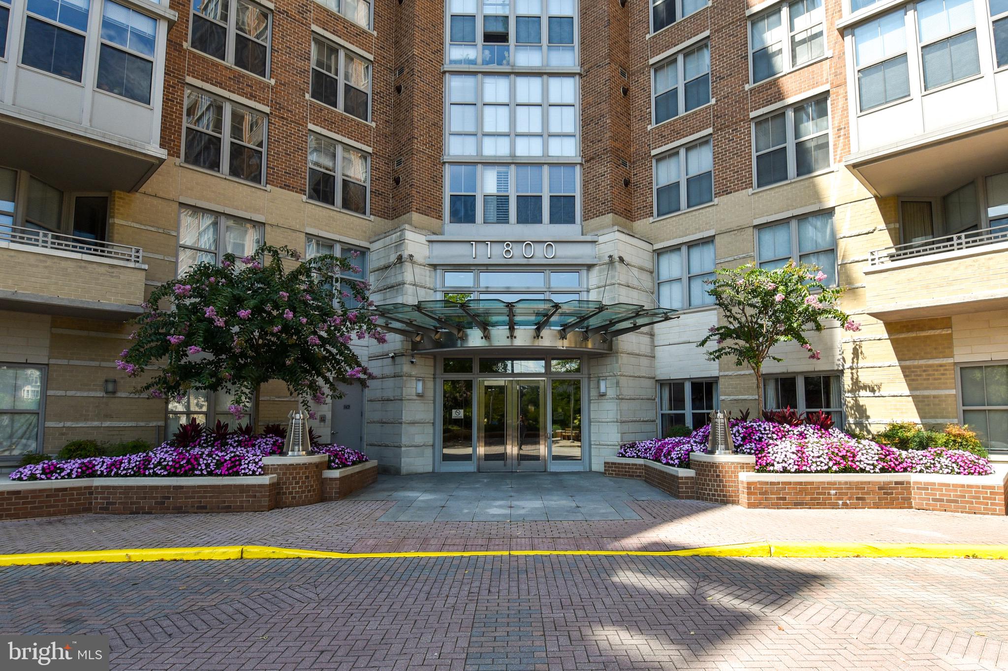Steps away from Reston Town Center! Luxurious 1 BD/1BA Condo with bonus sunroom off living room. Bright & Modern with great views..Upgrades include granite counters, SS appliances, newer washer & dryer and water heater. Enjoy all the amenties of the Carlton House with pool, gym, grand club room, concierge and security..One garage parking space, extra storage..Close to Whole foods and Metro!