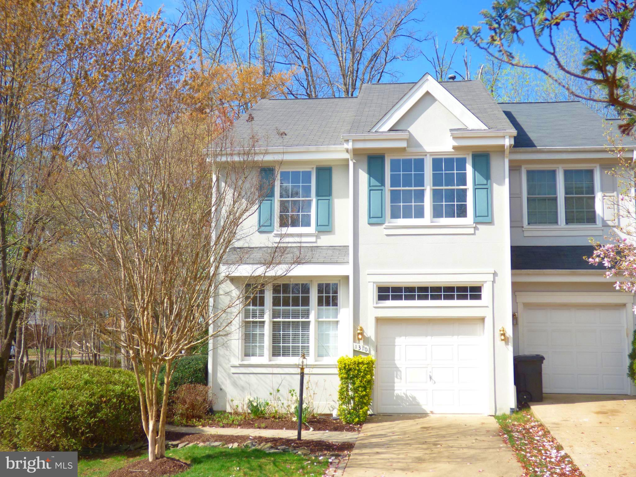 Stunning 3 level, one car garage, end unit luxury townhome located at the end of a tranquil and picturesque North Reston cul-de-sac that feel like a single family home! Sun lit, 2 story foyer, gleaming hardwoods floors, gourmet French Country eat-in kitchen with center island, all 4 baths elegant & luxurious! Light & bright great room with custom louvered shutters on the large windows and a wood-burning fireplace with a beautiful marble surround. Upper level features  spacious bedrooms with lower level rec room, bedroom and full bath with walk out to custom brick patio & spiral stairs leading to maintenance free Trex Deck! Lush landscaping. Outdoor lovers dream with access to North Hills Tennis and Pool, St. Johns Pavilion, walking paths and convenience of Capital Bike Share rentals. Conveniently located between Reston Parkway and Route 7, this home is located minutes  from the North Point Village Center, Reston Town Center, and Silver Line Metro Station.