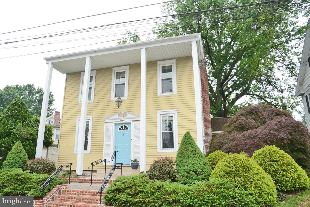 Great Southern Colonial in Mount Joy Borough within walking distance of the new train station! Hardwood floors under the carpet in many first and second floor rooms, brand new furnace, and very little exterior maintenance makes for a home just waiting for the right person and some elbow grease! Large, open Living Room greets you at the front door and walks through to the formal Dining Room, Family Room, Kitchen and Studio. The Family room addition also has a fireplace and access to the back patio area. The Formal Dining Room is large enough for holiday gatherings. Another addition added a studio for painting or it can be a sunny office or other hobby room. Casement windows light up this room! The kitchen features center island and is another gathering area for friends & family! Combination half-bath and laundry room just off the kitchen and Family Rooms. All three bedrooms upstairs and nice sized and have plenty of closet space. Large main bath and walk-up attic for storage space. Outside, three of the fours sides of the home is brick pavers. Small side yard allows for some gardens and a bocce game or two. The fenced east and south sides allow for privacy and plenty of space for entertaining.*******County & Municipal taxes are calculated with 2018 Assessment and millage rates. School Taxes are based on 2017 assessment and millage rates. 2018 School tax amount will not be known until the School district publishes the new millage rates. School taxes may be higher or lower than shown******