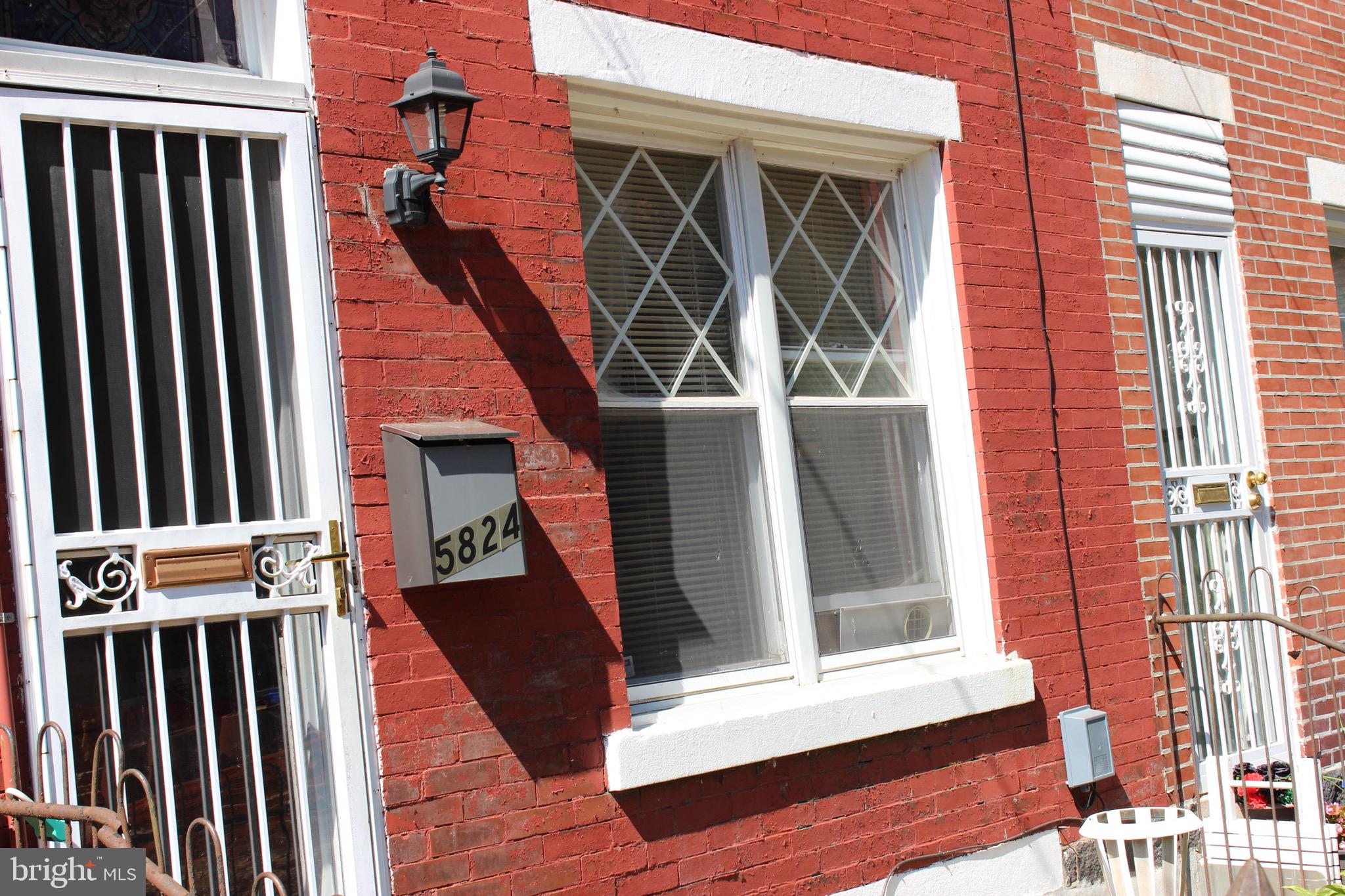 Move right into a sunny townhome in Germantown. This well maintained property offers tall ceilings, open floor plan, living room, dining room and eat-in kitchen with plenty of cabinet space. The kitchen features a door that enters into a spacious back yard. There are are two good sized bedrooms, and a hall full bath. The utility room is in the basement with washer and dryer.  Enjoy the many restaurants, markets, and shops of Germantown Avenue are a short walk away and public transportation is nearby as well. Make an appointment to see this special home today!