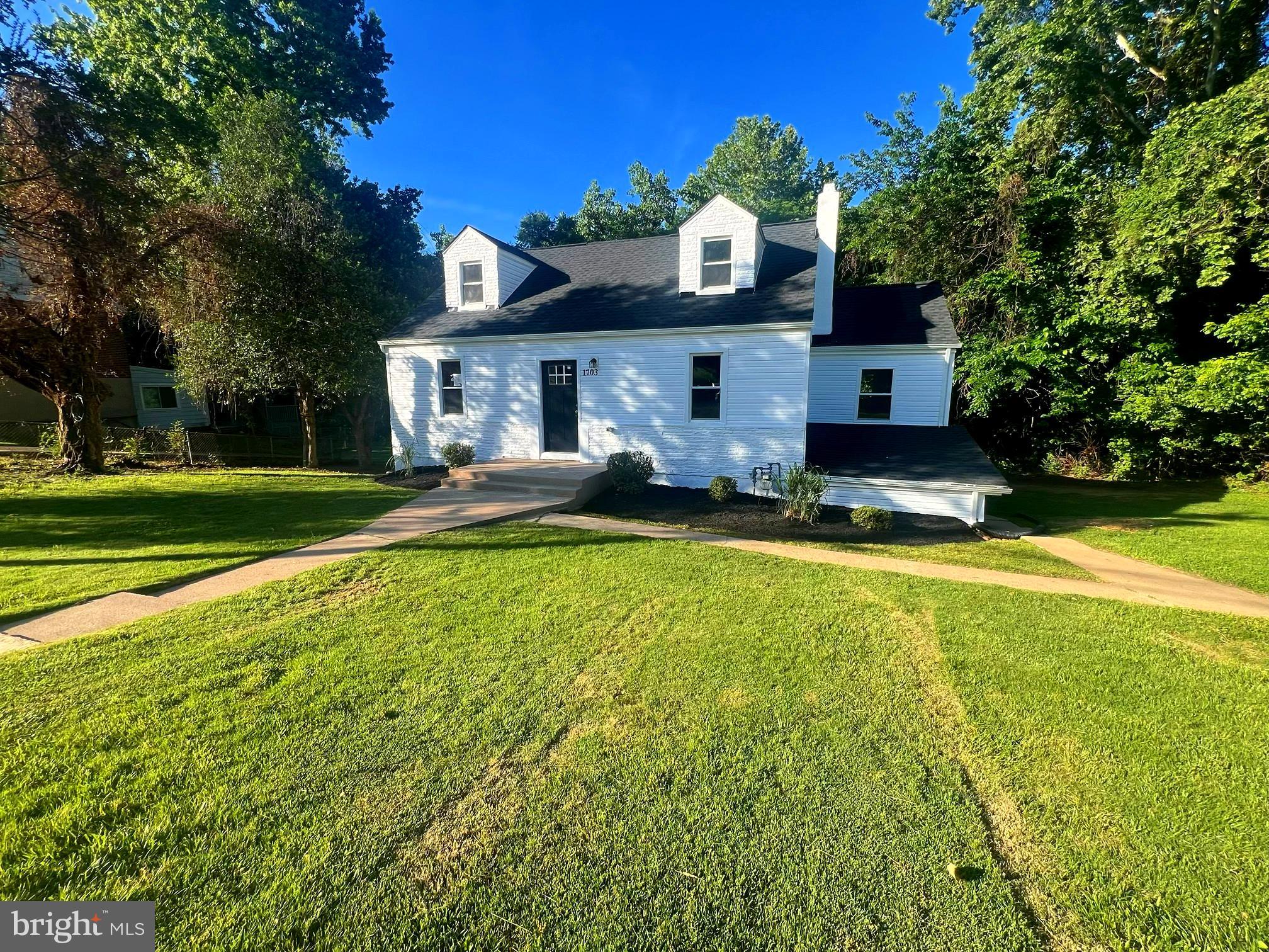 Discover the perfect blend of privacy, space, and convenience in this beautifully maintained brick rambler nestled on nearly half an acre backing to mature trees. Enjoy a peaceful, nature-filled setting where birds sing, wildlife visits, and serene wooded views create your own private retreat. Dreaming of a large backyard? This expansive, level lot offers endless possibilities for entertaining, gardening, play, or simply relaxing outdoors.  Inside, you'll find a thoughtfully updated home featuring a recently renovated kitchen and bathrooms, fresh paint, and updated appliances—making it a truly move-in-ready home.  Featuring a total of 5 Bedrooms plus 3 Full bathrooms, a spacious living area, and picturesque views, it brings comfort and charm to every room.  Ideally located with easy access to Washington, DC, Virginia, and National Harbor, this home offers the best of both worlds: a tranquil setting with exceptional views.  Don't miss this rare opportunity to own a beautifully updated home on a premium wooded lot!