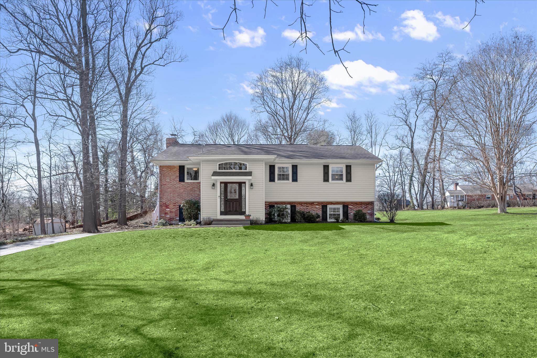 ****Offers due by Monday, 3/23 @ Noon******
Meticulously maintained split-level home in Columbia's highly sought-after Allview Estates. Updated throughout, this home features an open floor plan with beautiful hardwood flooring in the living and dining areas, which open to a deck overlooking serene, landscaped views.  Enter through the spacious, expanded foyer with two closets and ascend the oak staircase to a sun-filled open floor plan featuring inviting living and dining areas that flow seamlessly into the gourmet kitchen showcasing an oversized island with dining space, granite countertops, rich cherry wood cabinetry, and stainless steel appliances. Hardwoods extend to all main-level bedrooms, with the primary bedroom boasting a renovated en suite bathroom with dual granite vanity, water closet, and a glass-enclosed shower with decorative tile. Two additional spacious bedrooms and an updated hall bathroom complete this level. The walkout lower level offers a family room with a wood-burning fireplace in brick surround, plus a bonus room ideal for an exercise space or home office that leads to a fourth bedroom, perfect as a guest suite. This level also features a powder room, laundry area, and workshop. Step outside to enjoy both a covered and open patio, a landscaped lot, and a storage shed.  Residents enjoy access to the community's Atholton Swim Club and multiple sports courts including pickleball. Vibrant Columbia offers abundant shopping, dining, and entertainment options and convenient major commuter access routes.