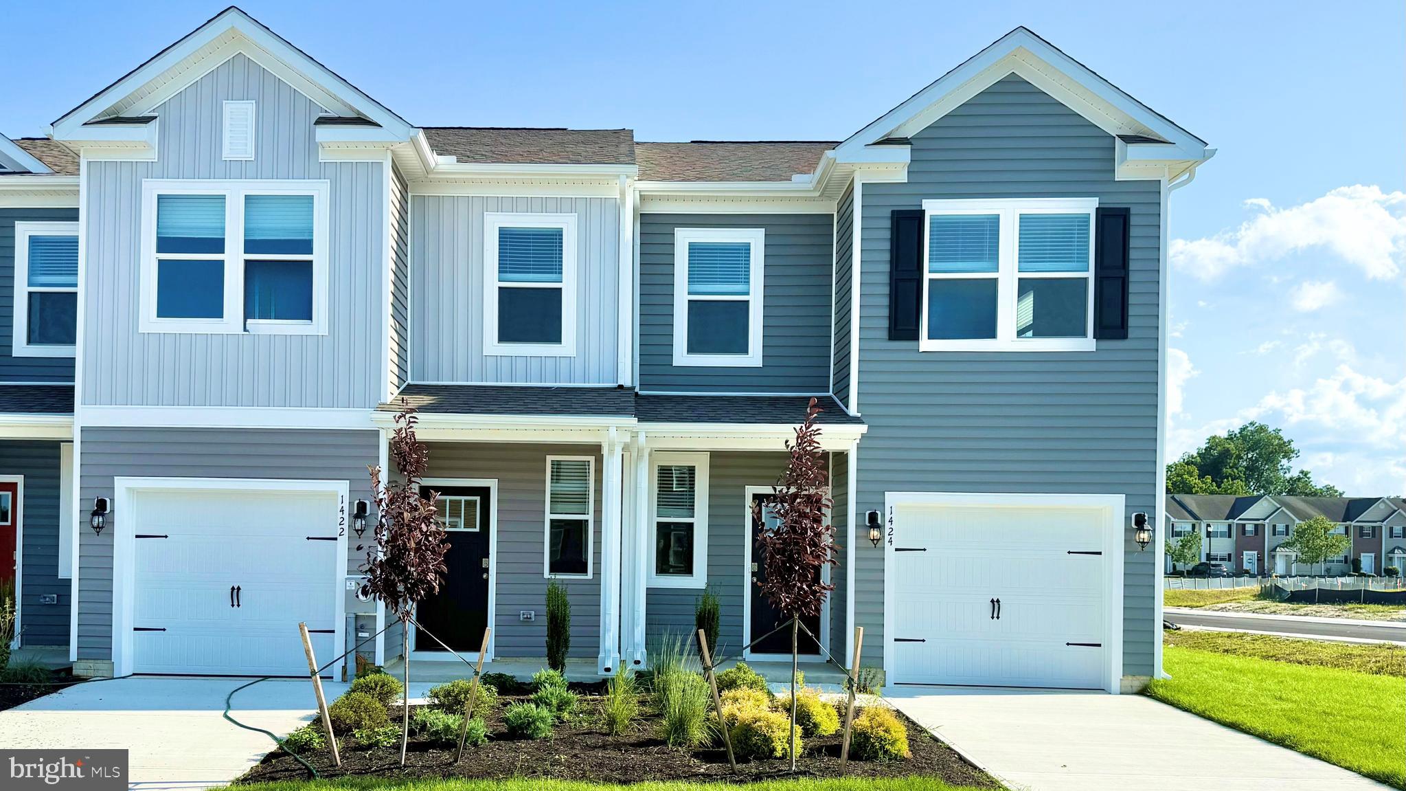 Enjoy an end-of-unit townhome located at 21464 Farmington Road in the new West Bay Village at Millville by the Sea offering modern living in Frankford, DE. The Delmar townhome is the perfect balance of comfort and convenience. This thoughtfully designed 1,500 sq. ft. townhome features an open first floor layout with a spacious living area, dining room, and modern kitchen complete with granite countertops—ideal for both everyday living and entertaining. A convenient half bath and one-car garage complete the main level.

Upstairs, you’ll find three bedrooms, including a relaxing owner’s suite with a private bath, plus a second full bath and a centrally located laundry area for added ease. With its smart design and coastal location near Bethany Beach, the Delmar is the perfect place to call home year-round or as your beach retreat.

Your new home comes complete with white window treatments, a fully sodded, landscaped, and irrigated lawn, and exclusive America’s Smart Home® package, ensuring your peace of mind and comfort in every aspect of living. 

Pictures, artist renderings, photographs, colors, features, and sizes are for illustration purposes only and will vary from the homes as built. Image representative of plan only and may vary as built. Images are of model home and include custom design features that may not be available in other homes. Furnishings and decorative items not included with home purchase.