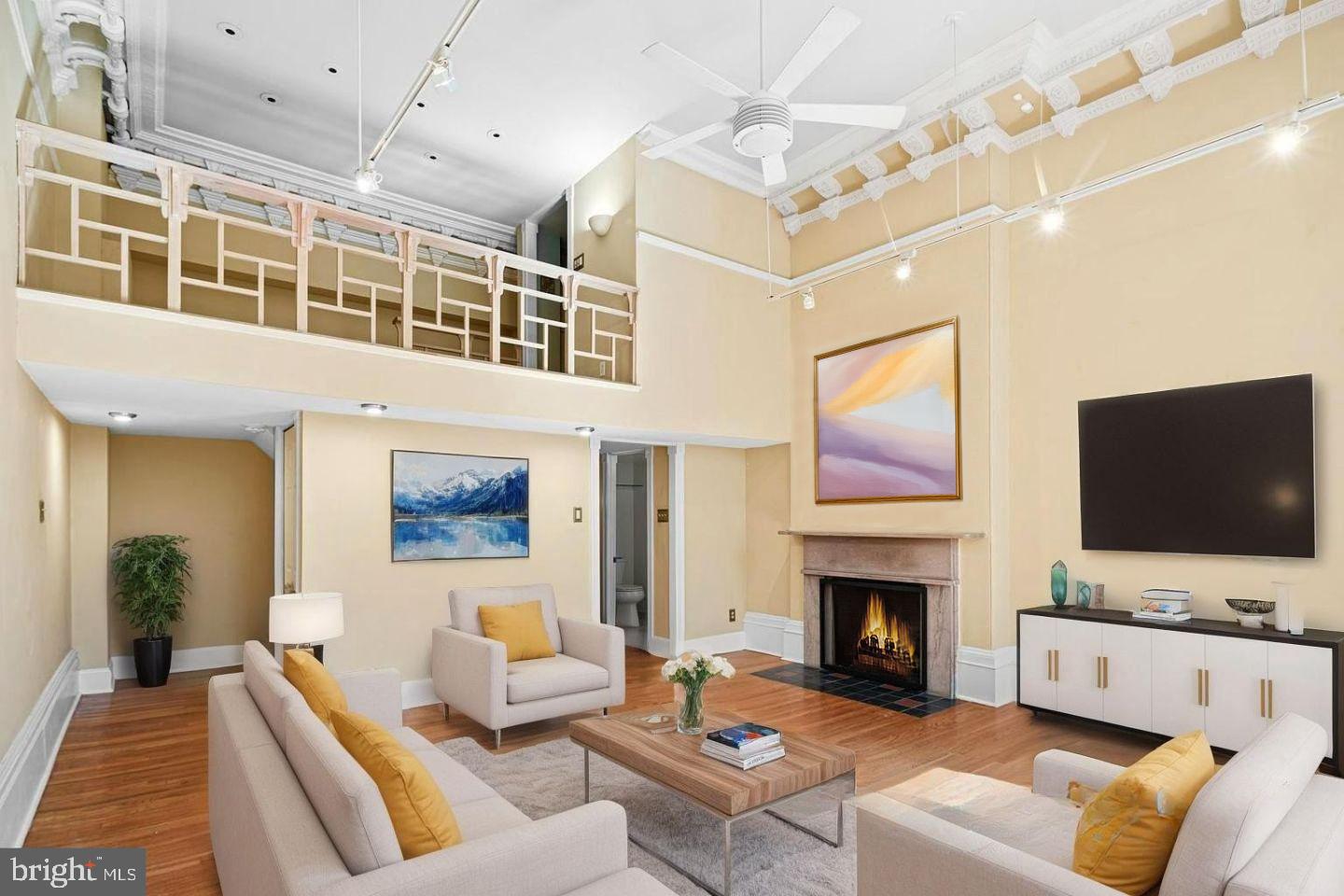 This exceptional 1-bedroom, 1.5 bath condo in the sought-after Strickland Row Condominiums offers an expansive and light-filled living experience across three levels. With soaring ceilings and tall windows featuring built-in shutters, this home seamlessly blends classic charm with modern convenience. Enjoy picturesque views of the courtyard and pool from the living room windows. The inviting living room centers around a sleek marble-surround gas fireplace, creating a perfect ambiance for relaxation. The custom kitchen has all the essentials and a brand new gas range. The oversized primary suite is a true retreat, featuring a massive walk-in closet with custom organizers and a newly installed washer and dryer. The primary bathroom features clean, modern finishes for a simple and relaxing feel. Strickland Row is a full-service community with top-tier amenities, including a sparkling in-ground swimming pool, beautifully landscaped courtyard, and one of Center City’s most unique roof decks with nearly a 360-degree panoramic view. Additional perks include a barbecue area, bike storage, elevators, and abundant space for package deliveries. Centrally located, this condo offers convenient access to grocery stores, dining, transportation and entertainment. Even better, the condo fees covers EVERYTHING except internet, cable and phone.  Including building maintenance, as well as upkeep of the pool, grounds, on-site maintenance and on-site management. Be sure to check the Condo Fee sheet for the full breakdown. Cats are welcome, and dogs are permitted if they are service or emotional support animals. Light filled. Amenity packed. Perfectly located. This is the kind of place you don't just tour, you fall in love with.  Contact listing agent for more details.