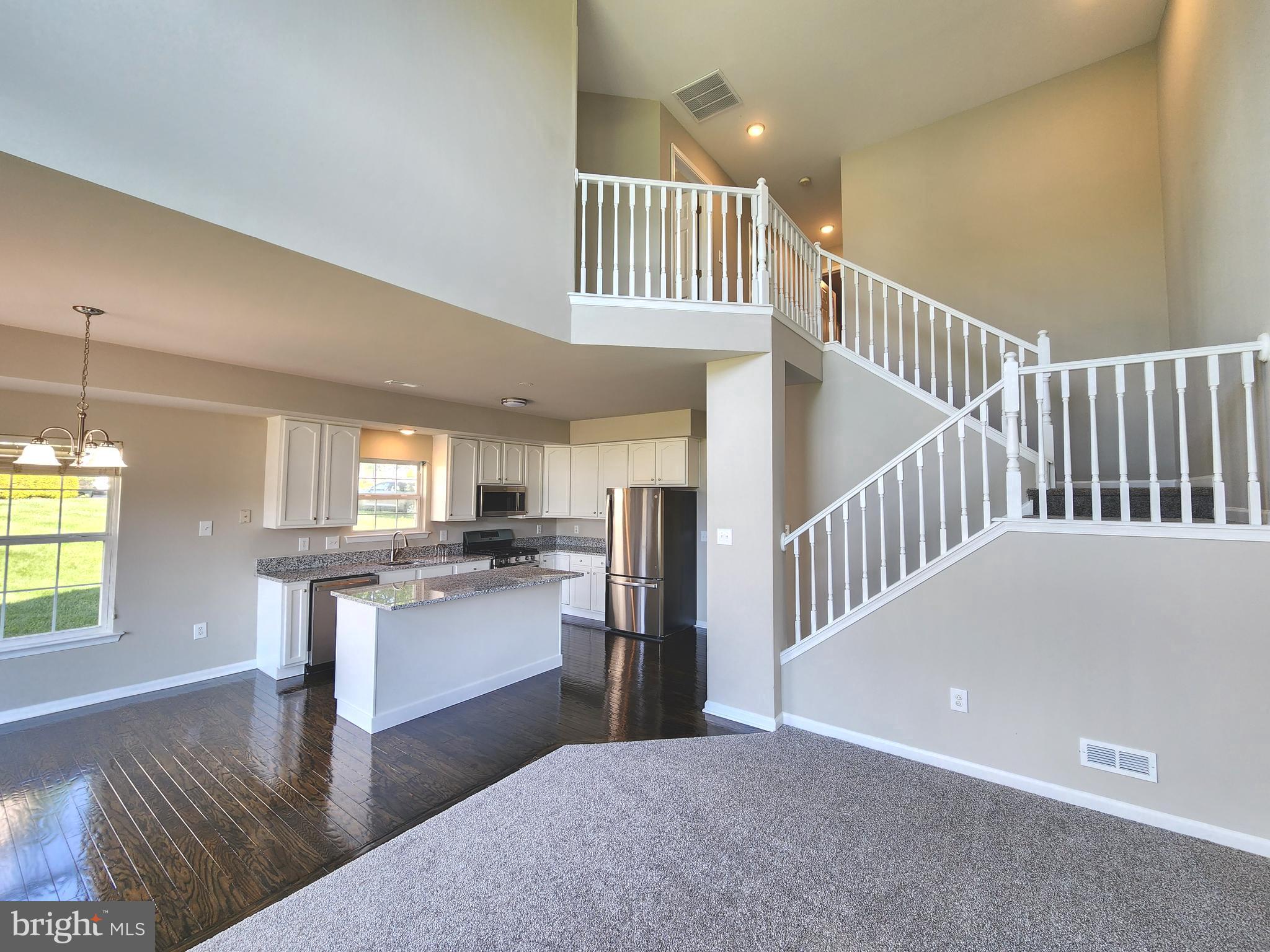 Come fall in love this summer.  Welcome home to this beautifully updated end-unit contemporary townhouse located in the quaint and desirable community of Walnut Ridge! From the moment you enter, you’ll be impressed by the dramatic 23-foot cathedral ceiling in the living room creating an open, bright, and airy atmosphere filled with natural light. Freshly painted throughout and featuring refurbished flooring, this move-in-condition home is ready for its next owner to simply unpack and enjoy. The updated kitchen shines with all-new granite countertops and stylish new fixtures adding a fresh modern touch throughout the home. Enjoy the added privacy and extra natural light that comes with an end-unit location, along with the comfortable contemporary design and easy everyday living this home offers. Conveniently located near shopping, dining, and major commuting routes, this charming Walnut Ridge townhouse is a wonderful opportunity you won’t want to miss!  Maintenance free living.