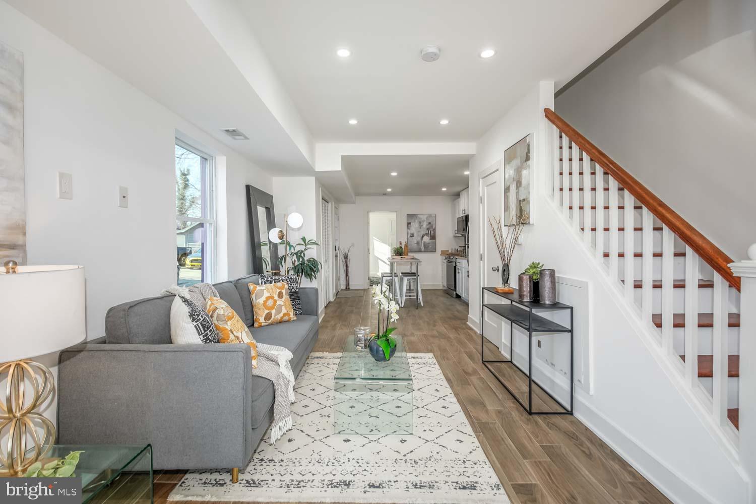 Welcome to this historic gem in the charming Fairmount Heights neighborhood. This stunning 4BR/2BA home beautifully blends modern renovation with the area's rich architectural heritage. Step inside to a light-filled interior where a thoughtful open floor plan creates an inviting atmosphere perfect for both daily living and entertaining. The spacious living area seamlessly flows into a designer kitchen featuring sleek stainless steel appliances and durable countertops that combine functionality with contemporary style. The main level offers a convenient bedroom and full bathroom, while the upper level is adorned with three additional bedrooms and another full bathroom, all designed with energy efficiency in mind to minimize utility costs. Outside, the property boasts a deep backyard that is flexible and open to your imagination, allowing you to maximize its potential for gardening, recreation, or outdoor entertaining. This property reflects the neighborhood's distinctive architectural character, providing an exceptional living space that connects you to a vibrant community with a rich history.