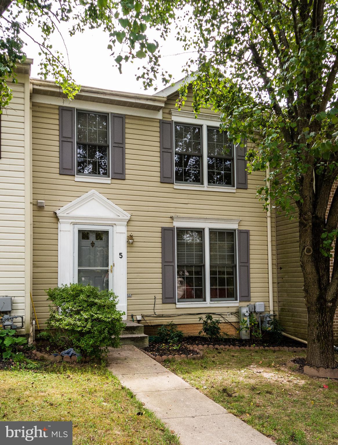 ***Price adjustment***This spacious 3/4 bedroom 2 full and 2 half bath townhome in a most convenient location in OM,  is awaiting you. Freshly painted and carpeted, this home has a large rear deck that leads you to the backyard.  Home has a great lower level with den/ bedroom, family room with wood burning fireplace, and walkout to backyard.  Upstairs you will visit 3 bedrooms, all with vaulted ceilings including the master bedroom with an suite bath.  Easy to show and you'll love it!!!***