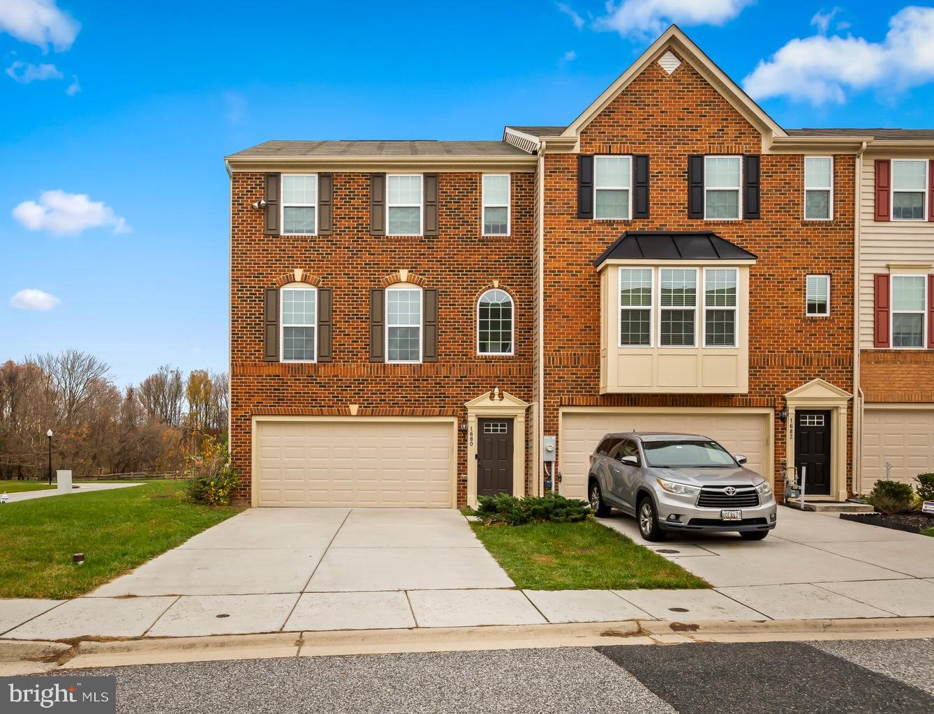Welcome to your dream home! This freshly painted, stunning end-of-row townhome is the epitome of move-in ready luxury. Boasting an attached two-car garage, this home combines convenience with style. The open-concept main level is an entertainer's delight, featuring a spacious living room, dining area, and a gourmet kitchen equipped with granite countertops, stainless steel appliances, and a lavish oversized island. Step outside onto the rear deck, where you can savor the serene views of your own backyard oasis. Upstairs, the spacious primary suite awaits, complete with a tray ceiling, walk-in closet, and a private en suite bathroom. Two additional bedrooms and a full hall bath round out the upper level ensuring both comfort and practicality. The lower level is a bonus retreat, offering a generous rec room, a convenient powder room, and a walkout to the backyard, seamlessly blending indoor and outdoor living. Perfectly situated just seconds to Route 40 and minutes from I-95, Aberdeen Proving Ground, and Amtrak this residence offers easy access to everything you need. Whether it's shopping, dining, or experiencing the charm of downtown Havre De Grace, Bulle Rock, or Great Wolf Lodge, this location has it all!