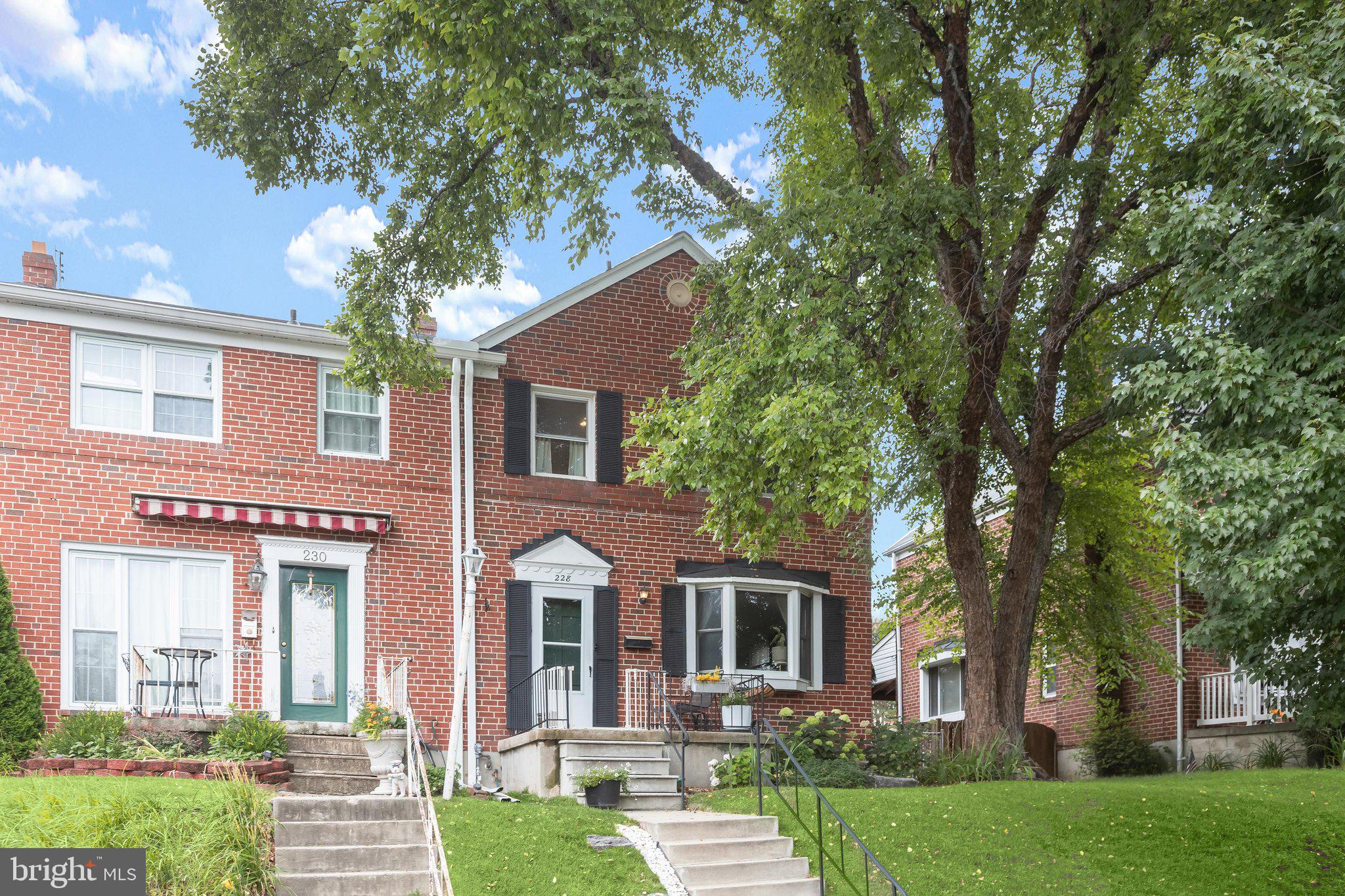Welcome to this beautifully updated end-of-group brick townhome, perfectly situated in the heart of sought-after Catonsville. Filled with natural light, this exceptional home blends timeless character with thoughtful modern updates, creating the perfect balance of charm and contemporary living. Step inside to a welcoming living room featuring gleaming hardwood floors, a cozy wood-burning fireplace, a bright bay window, and custom built-in shelving, an inviting space for relaxing or entertaining. The adjoining dining room continues the hardwood flooring and showcases its own bay window, providing an elegant setting for gatherings. The beautifully renovated kitchen has been thoughtfully opened to the dining room, creating an airy, open-concept feel. Designed with both style and functionality in mind, it features quartz countertops, stainless steel appliances, a breakfast bar, ample cabinetry, luxury vinyl plank flooring, and easy access to the incredible backyard. Upstairs, you'll find a spacious primary bedroom, two additional bedrooms, and an updated full bath. The finished lower level offers exceptional additional living space with a spacious family room, dedicated laundry area, abundant storage, and walk-up access to the backyard. Step outside to your own private outdoor oasis. The fully fenced backyard is beautifully landscaped and features a charming gazebo, expansive patio, and thoughtfully designed garden beds, perfect for entertaining, gardening, or simply unwinding. Recent improvements provide peace of mind and added value, including the renovated kitchen and bathrooms, HVAC system, luxury vinyl plank flooring in the kitchen, stainless steel appliances, washer, attic fan, gazebo, the removal of the kitchen wall to create an open flow to the dining room, professional landscaping, and many additional updates throughout. Ideally located just minutes from everything Catonsville has to offer, including Patapsco Valley State Park, local shops, restaurants, and convenient commuter routes, this move-in-ready home offers the perfect combination of comfort, style, and convenience.
