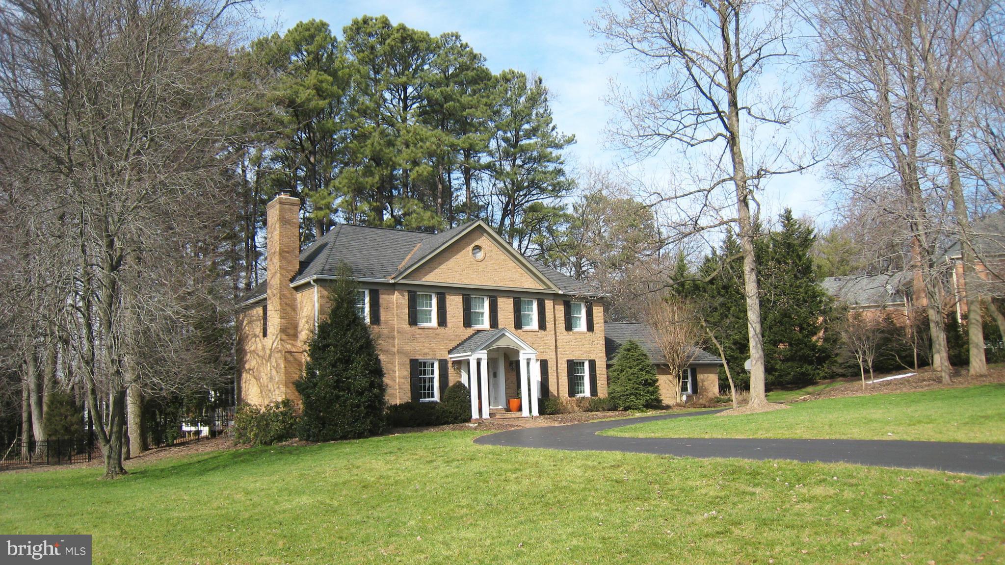 Refined & Remarkable!  Finest in design & finish with amazing zones for kids and adults.  Incredible floor plan for excellent flow and lots of natural light. Expansive designer kitchen open to family room with fireplace. Wonderful owner's suite is serene getaway. Screened porch & deck. One lush private acre and so convenient to Tyson's, McLean, commuter routes. A classic that feels so today.  WOW!