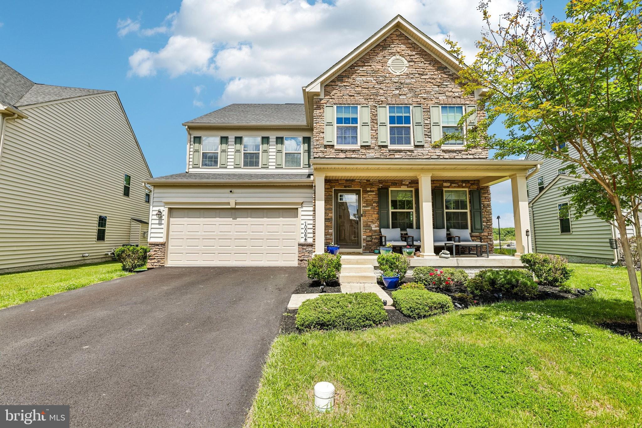 Welcome to 10064 Hutzell St — an impressive Oakdale Village home offering the perfect blend of space, comfort, and modern design. Built in 2018, this impressive 5-bedroom, 4.5-bath residence offers over 5,000 square feet with a flexible layout ideal for everyday living and entertaining.

The main level features dark walnut hardwood flooring, elegant formal living and dining rooms, and an inviting family room with a floor-to-ceiling stacked-stone gas fireplace that opens to the gourmet eat-in kitchen featuring a large center island, handcrafted TileBar backsplash, custom built-in cabinetry, and generous gathering space.

Upstairs, spacious bedrooms are complemented by a versatile loft-style living area perfect for a media space, lounge, play area, or home office. An upper-level laundry room adds everyday convenience.

The spacious finished lower level includes a full kitchen, full bath, bedroom, additional laundry area, storage space, and open recreation area ideal for entertaining, guests, hobbies, fitness, or multi-generational living.

Located near shopping, dining, commuter routes, and the highly sought-after Oakdale school cluster, this home offers the space, flexibility, and lifestyle today’s buyers are looking for.