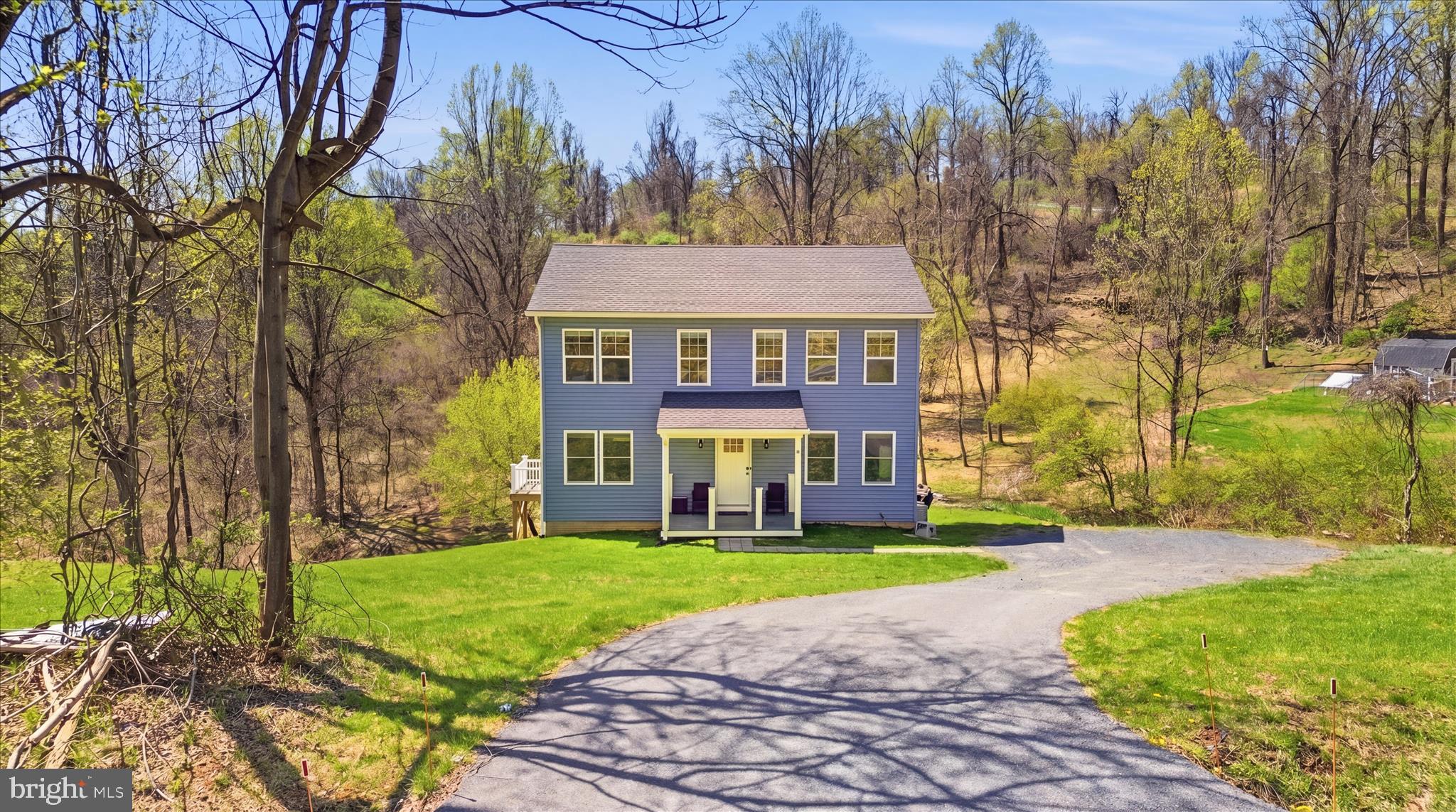 This stunning custom-built home, less than 3 years young, offers the perfect blend of modern design, thoughtful upgrades, and peaceful living on a beautiful 1.87-acre lot (created by combining three separate parcels at the time of purchase). With approximately 3,060 total square feet, including 2,040 finished square feet and a 1,020 square foot walk-out basement, this home provides both comfort and exceptional potential for future expansion.

The open-concept main level is designed for both everyday living and effortless entertaining, featuring durable waterproof luxury vinyl plank flooring throughout and a seamless flow between the kitchen, dining, living, and flex spaces. The modern kitchen is truly the heart of the home, complete with granite countertops, a spacious island, stainless steel appliances, soft-close cabinetry and drawers, and a large pantry. A convenient walk-out leads directly to the upper deck—perfect for indoor-outdoor living. The main level also includes a half bath and a spacious laundry/mudroom with washer, dryer, utility sink, and a separate side entry ideal for a future garage or direct access to the driveway.

Upstairs, you’ll find all four bedrooms, including a spacious owner’s suite with a walk-in closet and private ensuite bath featuring a dual vanity. Three additional generously sized bedrooms and a large full hallway bath complete the upper level.

Step outside to your own private retreat featuring a thoughtfully designed double-tier Trex deck system. Both the upper and lower decks (each measuring 12x24) are connected by stairs and a landing and include composite railings, latching gates, and access to ground level. The walk-out basement opens directly to the lower deck, enhancing the home’s indoor-outdoor functionality. Enjoy peaceful evenings on the lower deck swing or gather around the rock campfire pit while taking in the serenity of your expansive property.

The unfinished walk-out basement offers incredible flexibility, with rough-in plumbing for a future bathroom and additional materials—including drywall, porch railing, and a vanity—already on site and ready for your finishing touches.

Major systems include a 1,500-gallon septic system (recently pumped and inspected March 2026), well water with a full treatment system (softener, UV light, and tank), and dual-zone HVAC with two heat pumps, providing efficient, customizable climate control throughout the home.

This home is also equipped with modern connectivity, featuring CAT6 ethernet wiring throughout, multiple network drops, and existing Xfinity cable internet access—ideal for today’s work-from-home and streaming needs.

Conveniently located just minutes from Lake Mae, Liberty Mountain Resort, and Gettysburg National Golf Club, with easy access to U.S. Route 15, this home offers the perfect balance of privacy and accessibility.

Stay tuned for more details—this one won’t last long!