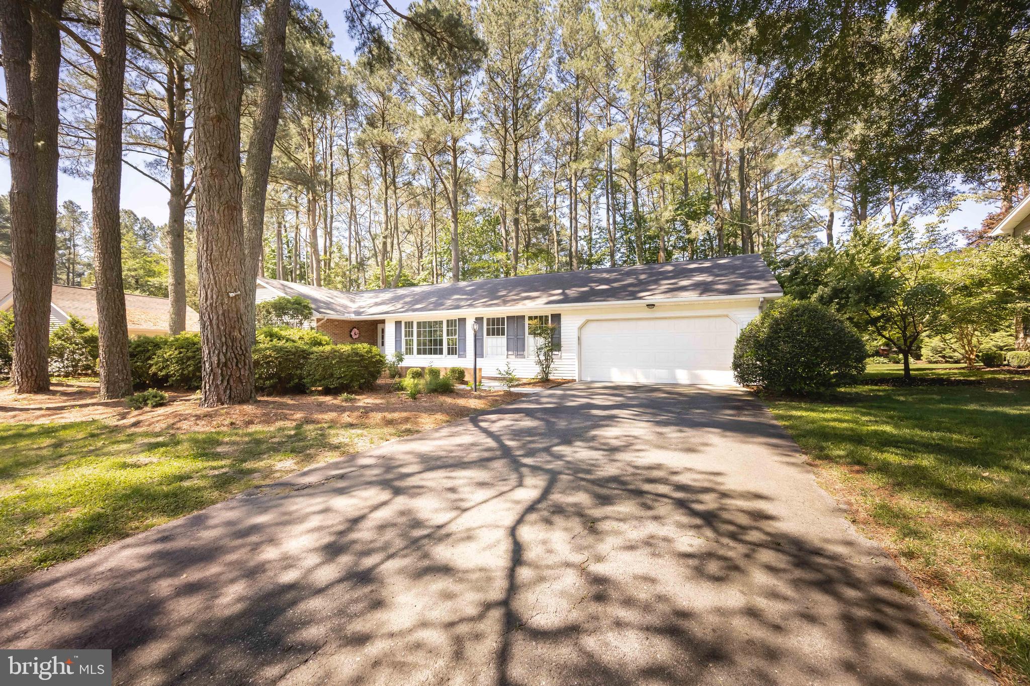 Welcome to 108 Covered Bridge Lane — a beautifully refreshed 3-bedroom, 2-bathroom home offering 2,023 square feet of comfortable living in Fruitland. Move-in ready with thoughtful updates throughout, this property is the one you've been waiting for. Fresh paint, new light fixtures, and new carpet in the living room, which create a bright, welcoming feel from the moment you walk in. The living room also features a cozy brick fireplace and custom built-ins, adding warmth and character to the heart of the home. The kitchen is outfitted with stainless steel appliances and durable LVP flooring and a beautiful breakfast area with the bay window that looks out to the flowering garden. The primary bedroom features a walk-in closet, attached bathroom, and access to the rear deck and backyard. Both bathrooms have been tastefully updated with new vanities and light fixtures. From the living room you can access and enjoy the screened-in porch with a natural gas heater — perfect for year-round relaxation or head out to the fully fenced backyard, great for pets, entertaining, and everyday outdoor living. The laundry room includes cabinetry for extra storage and organization. The attached garage features a ramp entry for easy accessibility, and the property's irrigation system runs off an on-site well with a brand new well pump. Major updates give you true peace of mind: a new heat pump installed in 2026, and the roof replaced in 2016. This home has it all — don't miss your opportunity to make it yours! Call today to schedule your private tour!