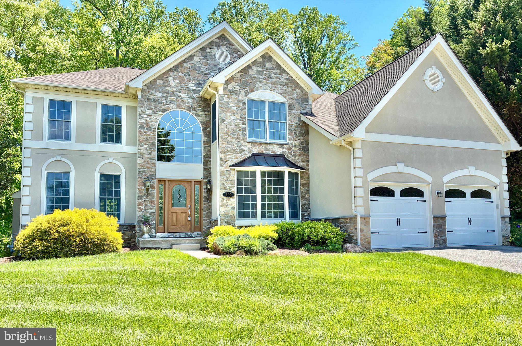 Nestled away in the highly desirable and serene enclave of Harford Green, this exquisite Colonial-style residence offers a harmonious blend of luxury and comfort, perfect for those seeking an elevated lifestyle. Spanning over 4,800 finished square feet, this meticulously maintained home boasts four spacious bedrooms and three and a half elegantly appointed bathrooms, ensuring ample space for relaxation and entertainment. This beautiful home is perfectly positioned at the end of a quiet cul-de-sac with a private backyard that backs to peaceful woods.

Step inside to a breathtaking two-story great room featuring floor-to-ceiling stonework, a dramatic fireplace, and spectacular views that bring the outdoors in. A second fireplace in the living room adds even more warmth and charm—ideal for cozy evenings or entertaining guests, and is perfect for unwinding after a long day.

The heart of the home is the gourmet kitchen, designed for both everyday living and hosting, complete with a generous center island and granite countertops. A spacious study with bay windows offers the perfect work-from-home space filled with natural light, while the main-floor powder room adds convenience for guests.

Upstairs, the primary suite is a true retreat, featuring a tray ceiling, a comfortable sitting area, and a massive walk-in closet. The deluxe primary bath feels spa-inspired with a soaking tub, separate shower, and dual vanities. Three additional bedrooms share a well-appointed hall bath, providing space and comfort for everyone.

The fully finished walkout level basement expands the home even further, offering a large rec room, a guest room, a full bathroom, and an impressive amount of storage.

Outside, enjoy the best of indoor-outdoor living with a large deck and patio, complete with a fire pit, all surrounded by serene wooded privacy. The outdoor space is perfect for hosting gatherings or simply enjoying the serene views where the tranquility of nature surrounds you. The location is unbeatable—featuring a path directly to the Emmorton Elementary School baseball field, and just a short walk to the Abingdon Library and the Bear Trail.

To top it off, this home includes an attached oversized 2 car garage equipped with an EV charging station, blending luxury with modern convenience, ensuring that your modern lifestyle is effortlessly accommodated.

This residence is not just a house; it's a place where memories are made, and a lifestyle of comfort and elegance awaits. Experience the perfect blend of luxury and nature in this stunning home, where every detail has been thoughtfully curated for your enjoyment.