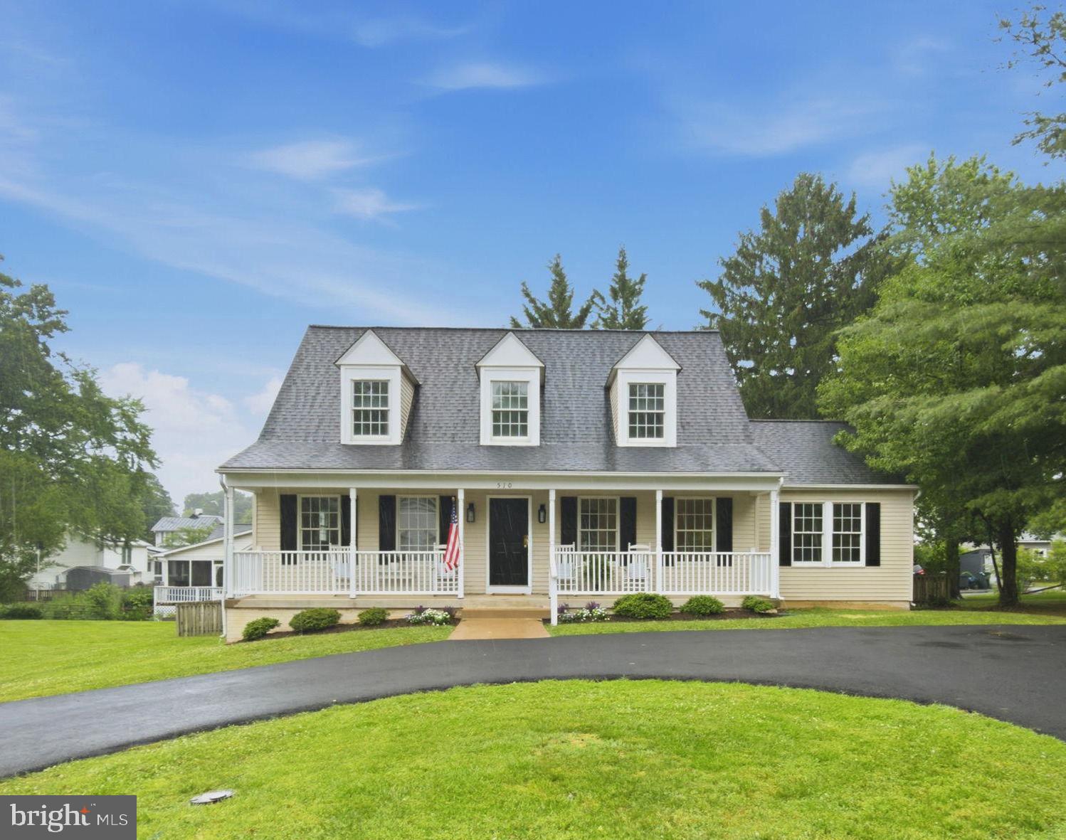 LOCATION..LOCATION..LOCATION!  Welcome home to this charming Cape Cod nestled in the heart of Purcellville!  As you approach the home, the charming front porch, complete with space for rocking chairs, welcomes and invites you to slow down and enjoy the simple pleasures of small-town living.

Offering the ease of main-level living, this recently refreshed 3-bedroom, 2 full and 1 half-bath home combines comfort, convenience, and small-town charm.

Step inside to find fresh paint throughout, new carpet, updated lighting fixtures, and an open yet warm and inviting floor plan with flexible living spaces. The spacious main-level primary suite is complete with an en-suite bath featuring both a soaking tub and a separate shower. The Primary bathroom has been recently updated with new flooring. Upstairs, you will find two generously sized bedrooms and an additional full bath, also featuring new flooring, creating the ideal layout for family, guests, hobbies, or a home office.

The large kitchen, complete with an island, offers plenty of space for dining and has been thoughtfully updated with new Stainless Steel appliances, refreshed hardware and updated lighting. From the kitchen, step outside to discover a fully fenced backyard, offering enough space for gardening, entertaining, or your four-legged companions to roam, without overwhelming upkeep.

The expansive unfinished basement, approximately 1,400 square feet, per Loudoun County tax records, includes a rough-in for plumbing and a walk-up exit, offering endless possibilities! Create the recreation room, home gym, guest suite, workshop, or additional living space you've always wanted.  The home also has a whole house generator.

Ideally located within walking distance of historic downtown Purcellville, you'll enjoy easy access to local shops, restaurants, community events, the Carver Senior Center, the Purcellville Community Center, and the highly anticipated Western Loudoun Recreation Complex, featuring an indoor swimming pool, fitness center, indoor running track, outdoor walking paths, and so much more!

Beyond town, enjoy being just minutes from grocery stores, restaurants, wineries, breweries, hiking trails, the Franklin Park Arts Center, the W&OD Trail, and Route 7 for an easy commute.

Additional updates just completed include a new asphalt driveway (2026), freshly painted front door and front shutters (2026), new carpet (2026), fresh interior paint (2026), new lighting fixtures (2026), new flooring in both full bathrooms (2026), new stainless steel appliances (2026), and updated kitchen hardware. Major systems include a roof replaced in 2020 and a water heater installed in 2019.  And..Sellers are offering an AHS home warranty!

If you've been searching for the perfect blend of one-level living, thoughtful updates, an unbeatable in-town location, and room to grow, 510 W. L Street is ready to welcome you home.